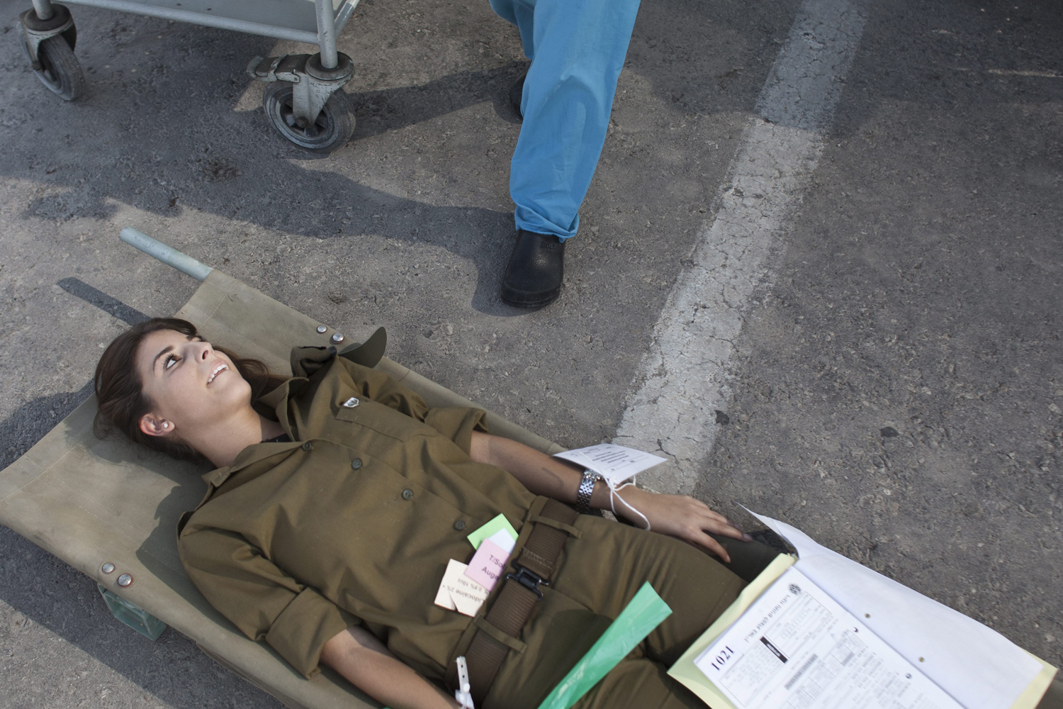 Image: Oct. 22, 2012. Medical staff at the Rambam hospital attend to a soldier pretending to be injured following a mock earthquake exercise in Haifa, Israel.