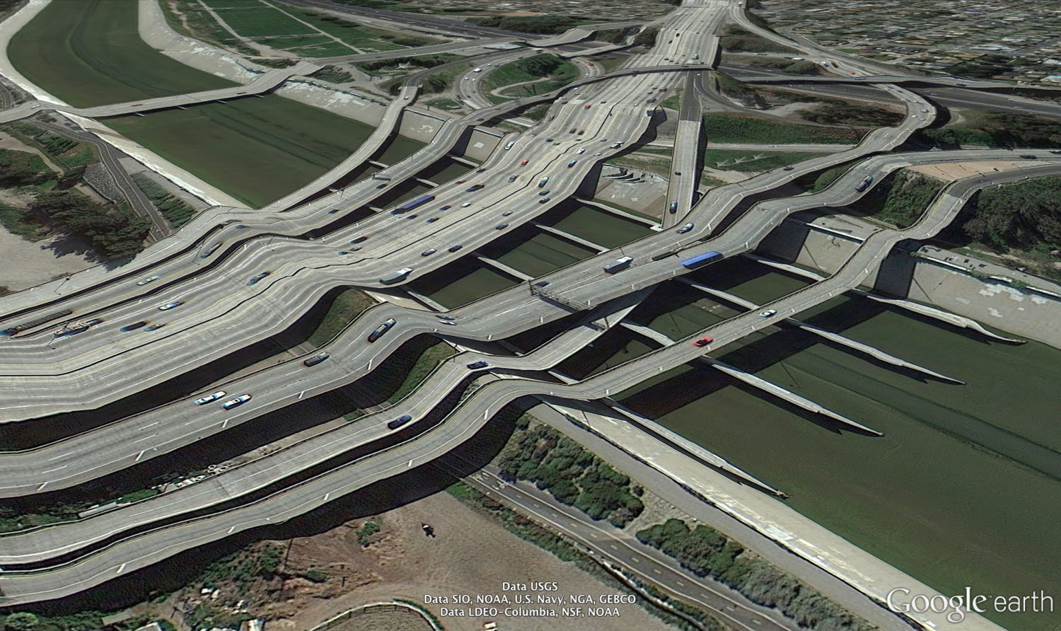 Postcards from Google Earth, by Clement Valla
                              Untitled
                               
                               I started focusing on these typologies — this peculiar condition that tends to occur around specific types of structures like, bridges, overpasses and bodies of water. Basically what happens is that Google gets a 3D model of the earth’s surface and then they take the aerial photography and just project it straight down onto the 3D model. Essentially these aerial photographs are being bent and stretched and distorted to fit the 3D surface of the earth.
                              
                              What I’m concerned about most with all of my work is the interplay between human elements and computer elements and how these impersonal systems or impersonal processes are producing this type of crazy new imagery.