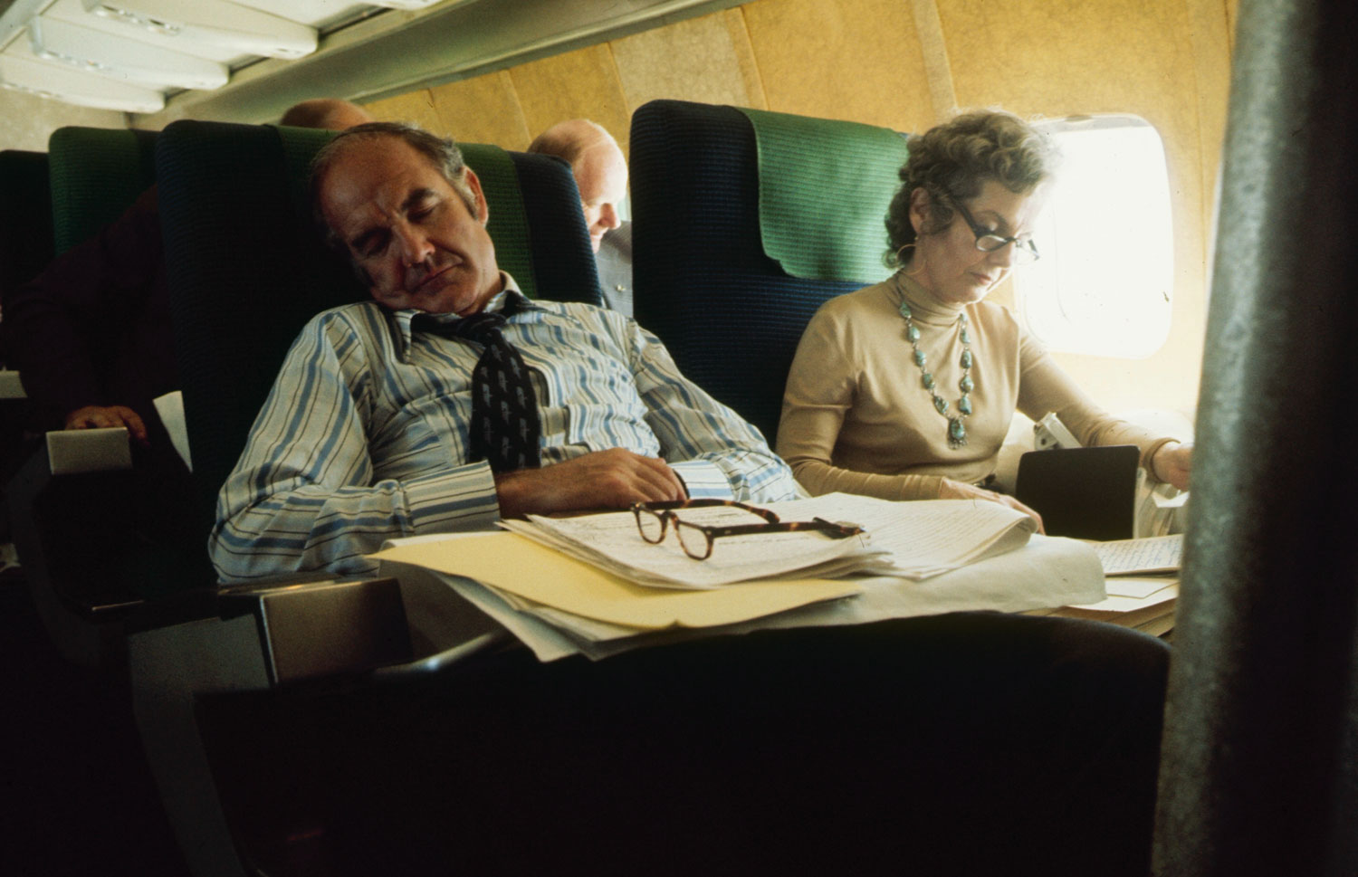 George McGovern sleeps on his campaign plane beside his wife, Eleanor, 1972.