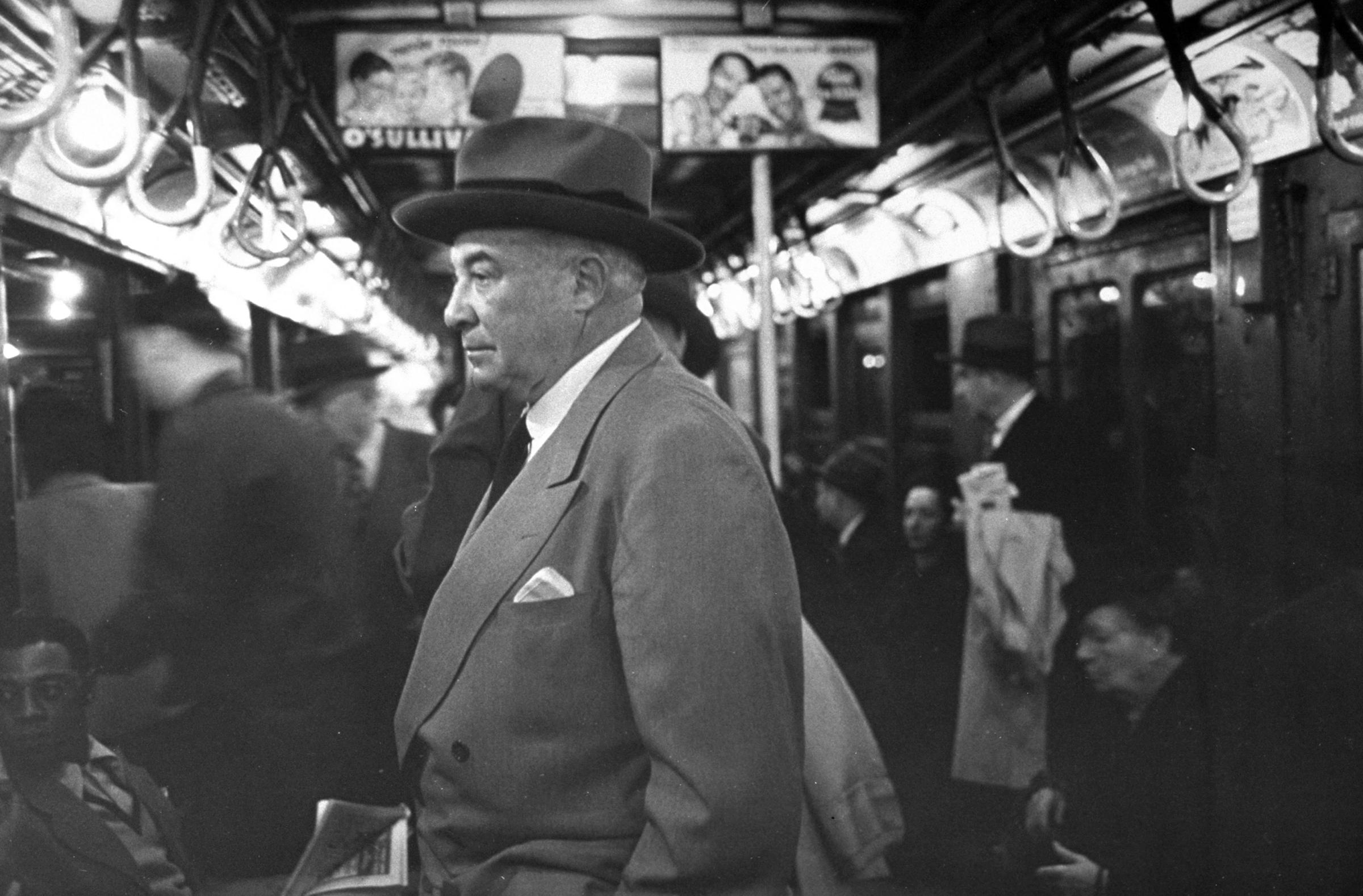 Department-store titan Bernard F. Gimbel rides the subway, 1949.