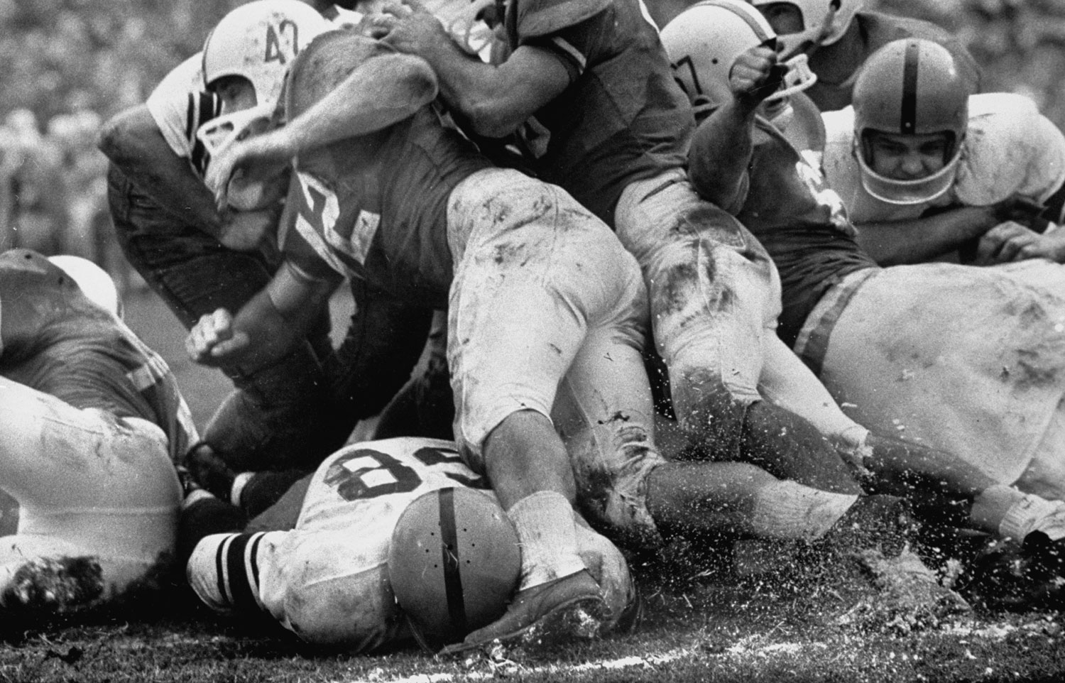 Syracuse vs. Texas, 1960 Cotton Bowl. Syracuse beat Texas 23-14 behind a great performance by Ernie Davis -- the first African American to win the Heisman.