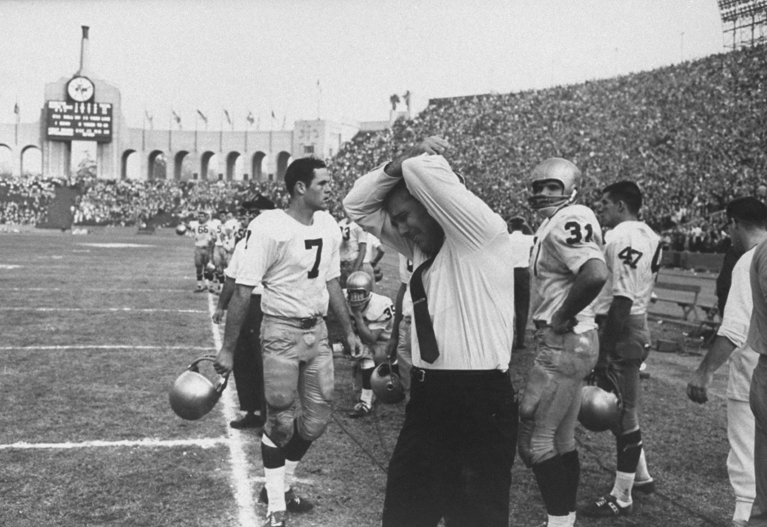 Notre Dame's legendary coach Ara Parseghian can't bear watching as the Fighting Irish lose in 1964.