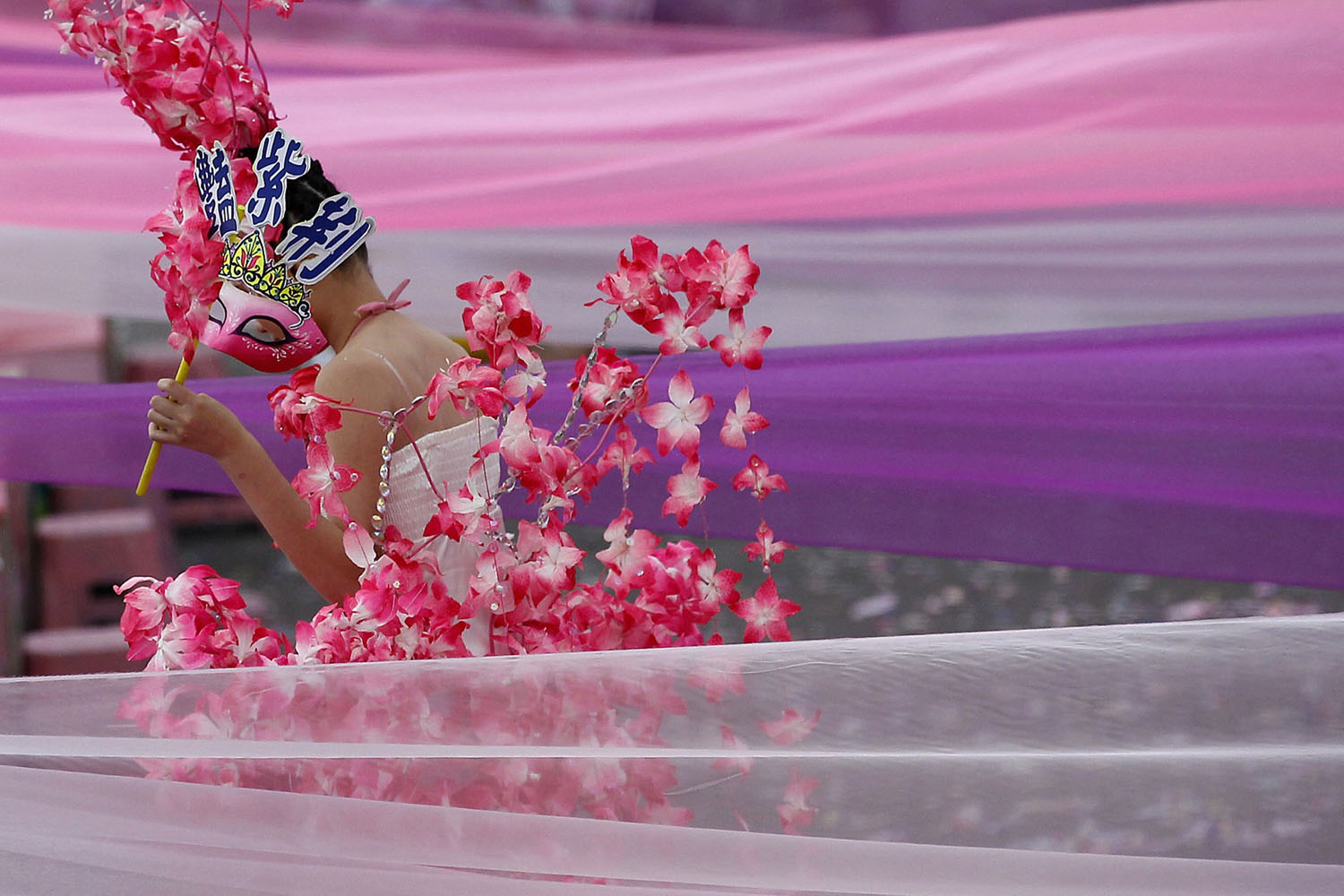 Oct. 10, 2012. A dancer performs during Taiwan's National Day celebrations in front of the Presidential Office in Taipei.