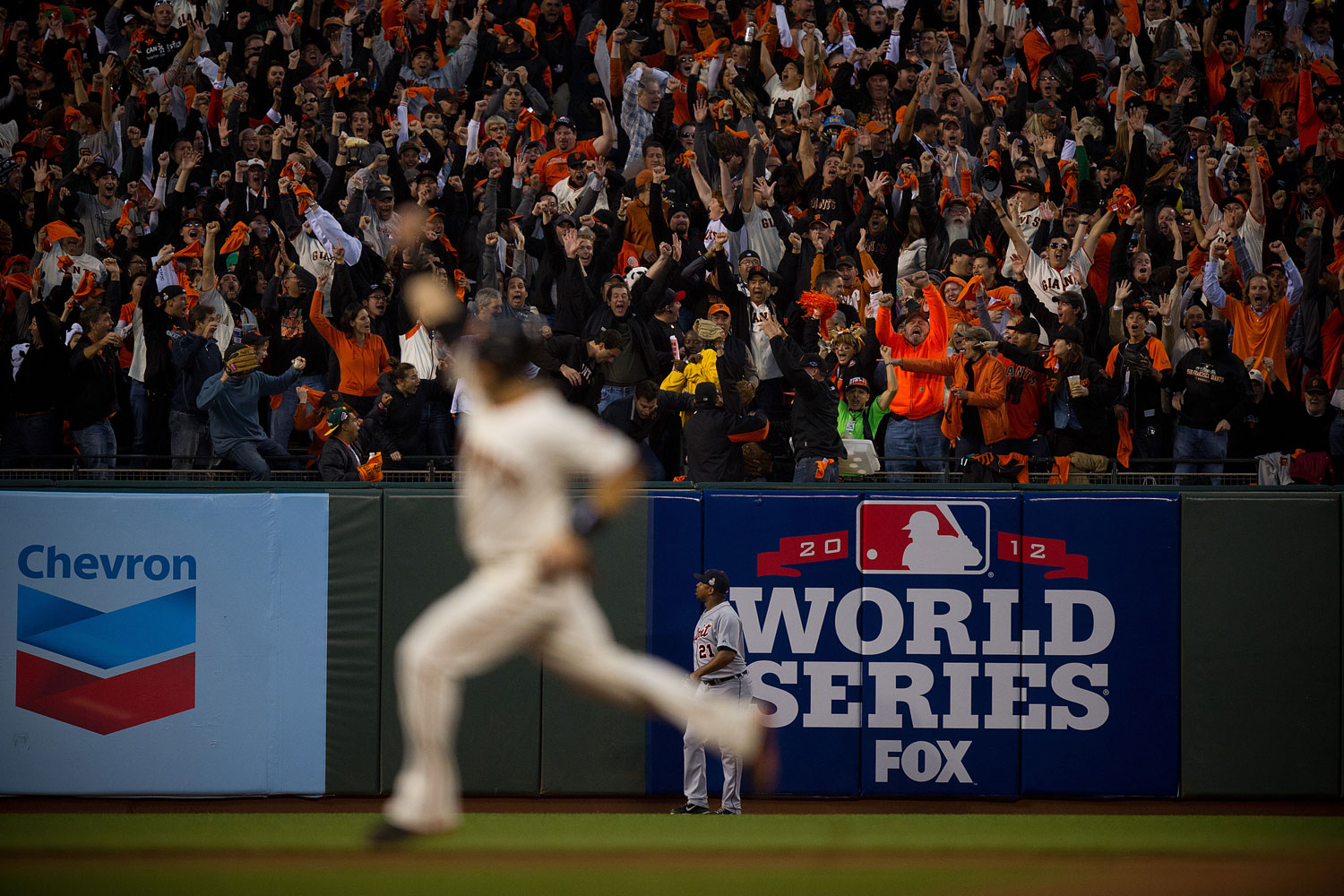 Image: Oct. 24, 2012. Detroit Tigers left-fielder Delmon Young watches as the San Francisco Giants' Pablo Sandoval second home run goes over the wall in Game 1 of the World Series at AT&T Park in San Francisco.