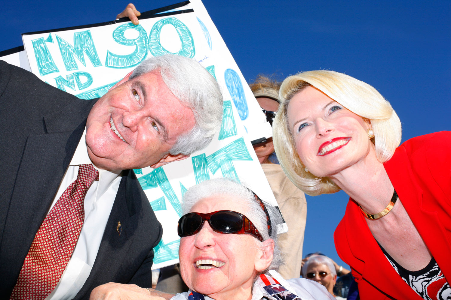Image: Newt and Callista Gingrich pose for photos during a rally at The Villages, Fla., Jan. 29, 2012.