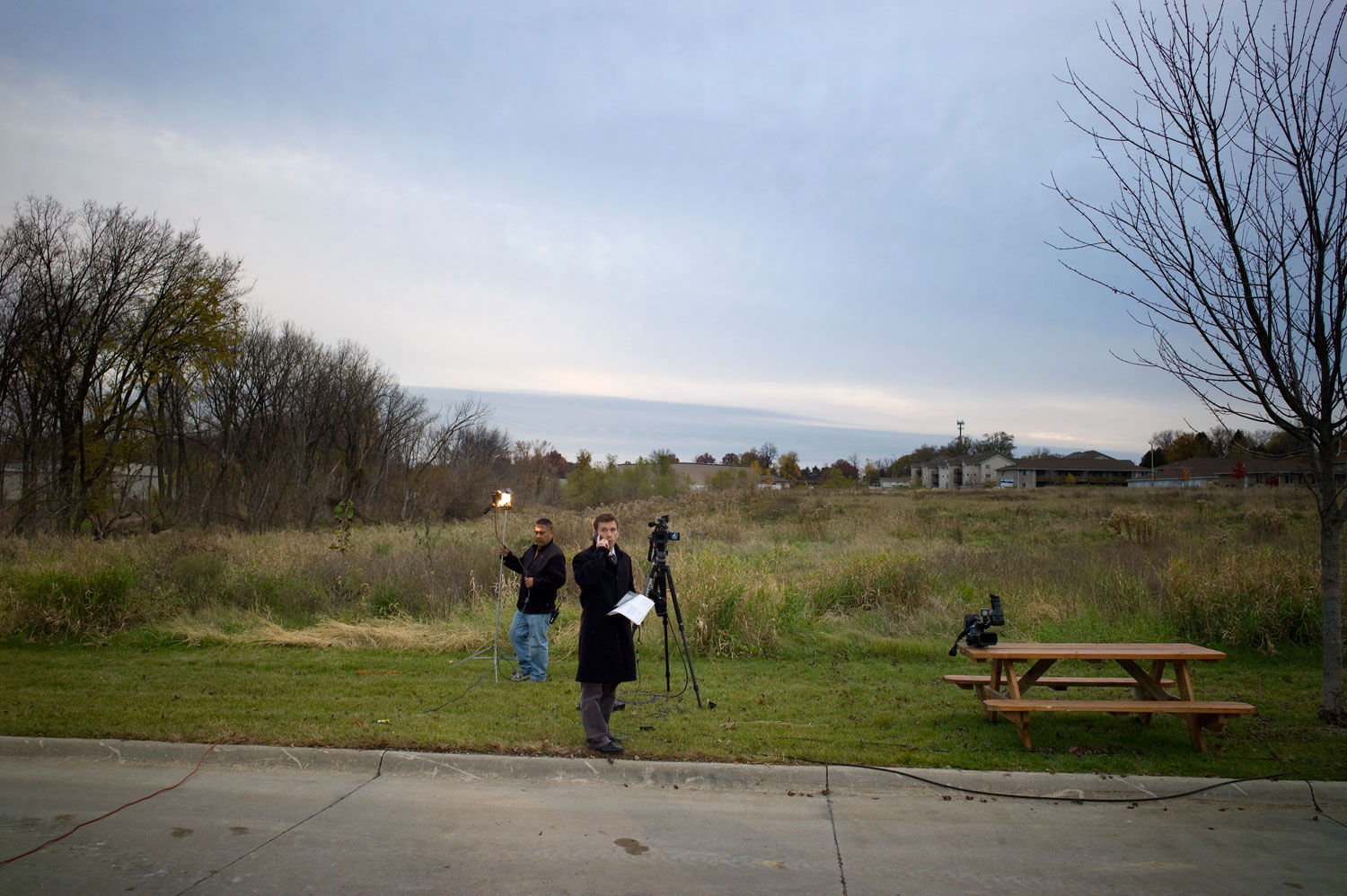 Image: Members of the press before a Mitt Romney campaign stop at Iowa American Water in Davenport. Nov. 7, 2011.
