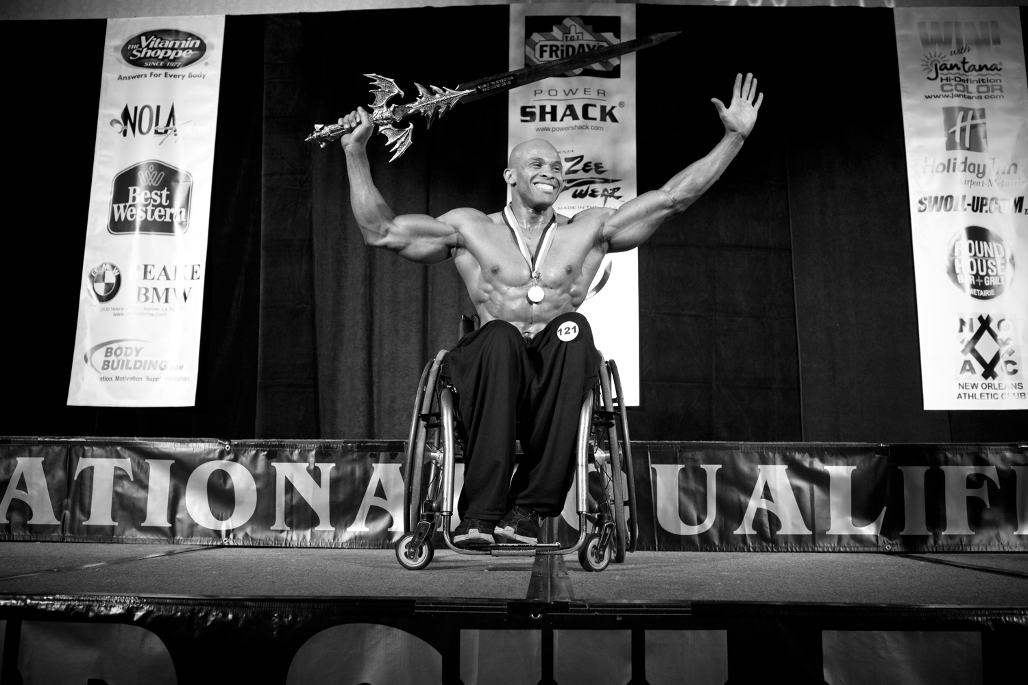 Harold Kelley holds up his trophy after winning first place at the NPC Wheelchair Nationals in Metairie, La.