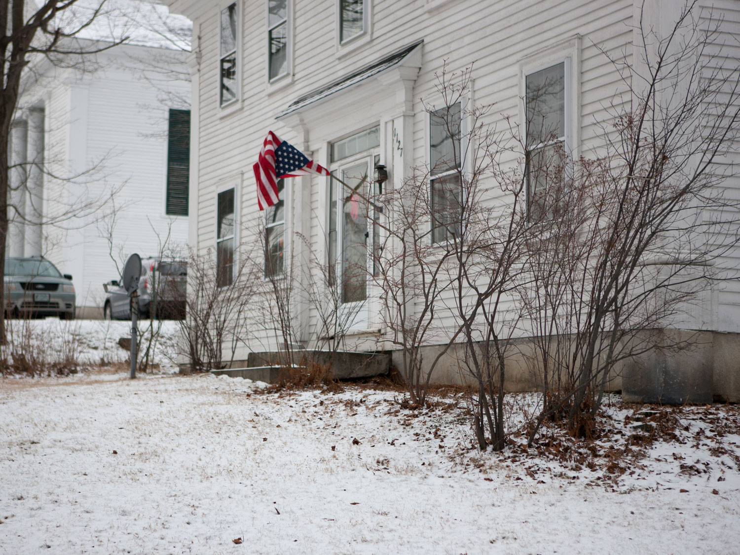 Image: A flag outside of a home in Keene, N.H days before the primary elections. Jan. 6, 2012.