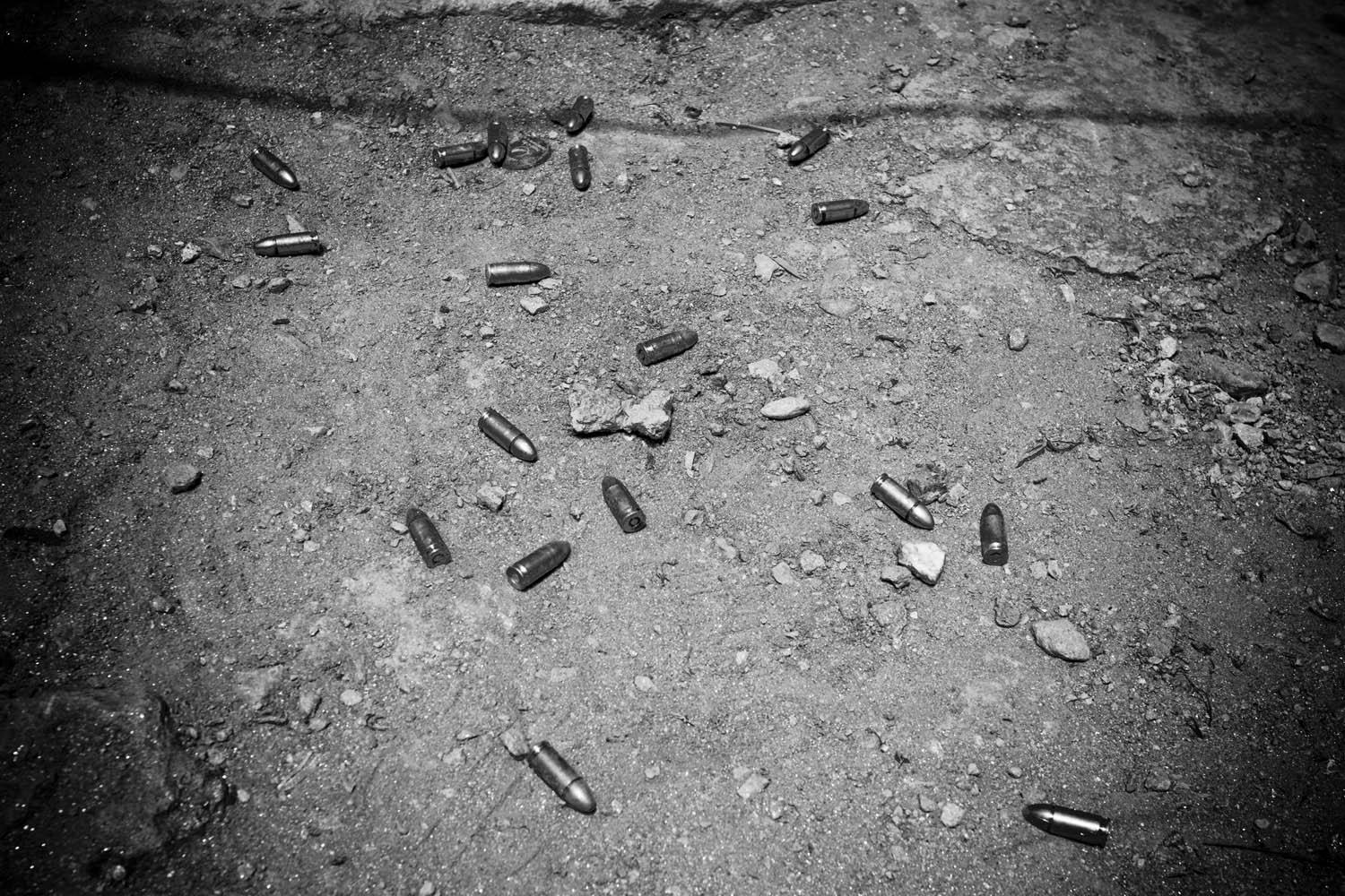 image: Bullets on the ground. The government estimates that there are more than 6 million weapons currently in the hands of civilians.