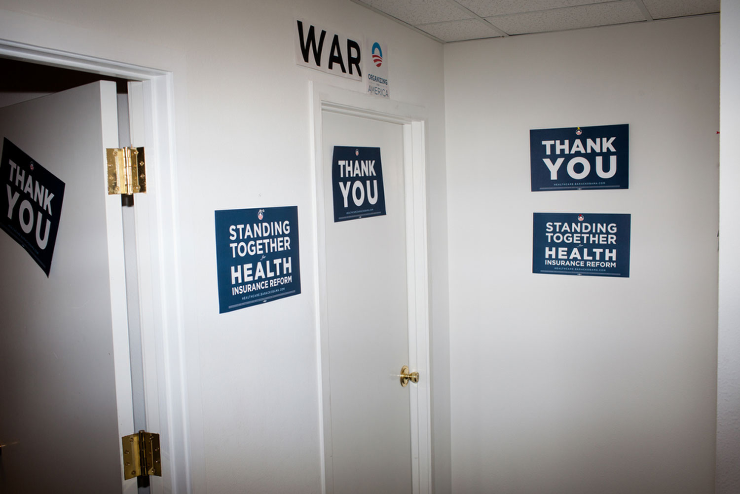 Image: Signs on a wall at Obama Headquarters in Phoenix. Arizona has historically voted Republican in recent presidential elections, though a string of conservative-backed anti-immigration legislation threatens to unify the state's oft-divided Latino vote against the Republicans in the upcoming election. Feb.12, 2012.
