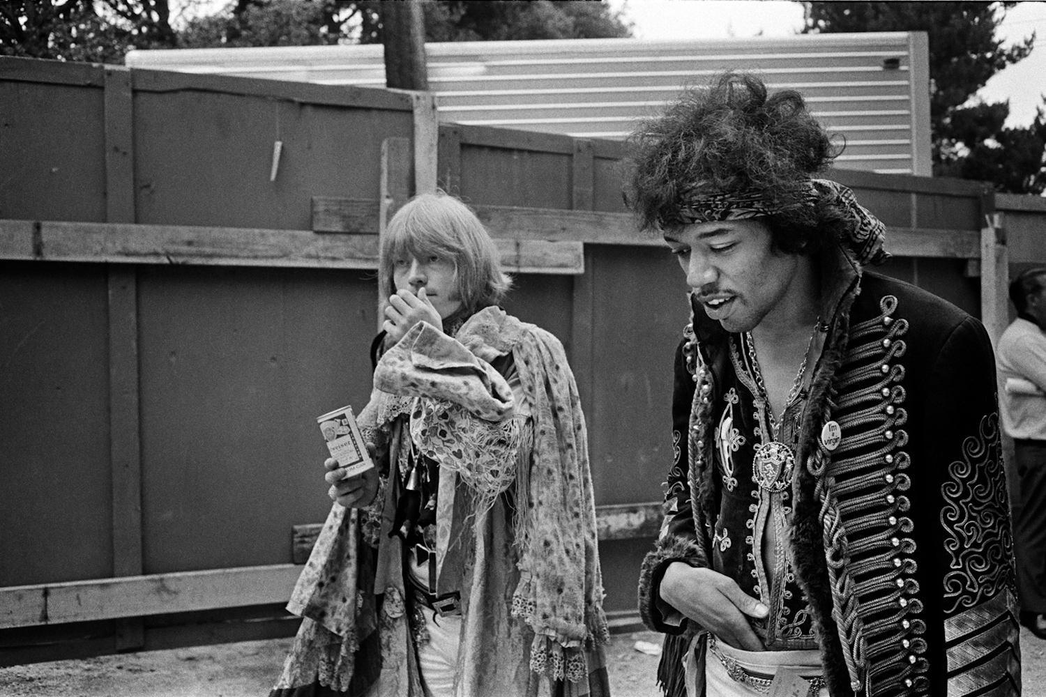 Image: Jimi Hendrix and Brian Jones walk backstage at Monterey Pop Festival, 1967.
