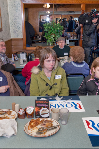 Image: Romney meets with voters to discuss jobs and the economy at the Family Table Restaurant in Atlantic, Iowa. Jan.1, 2012.