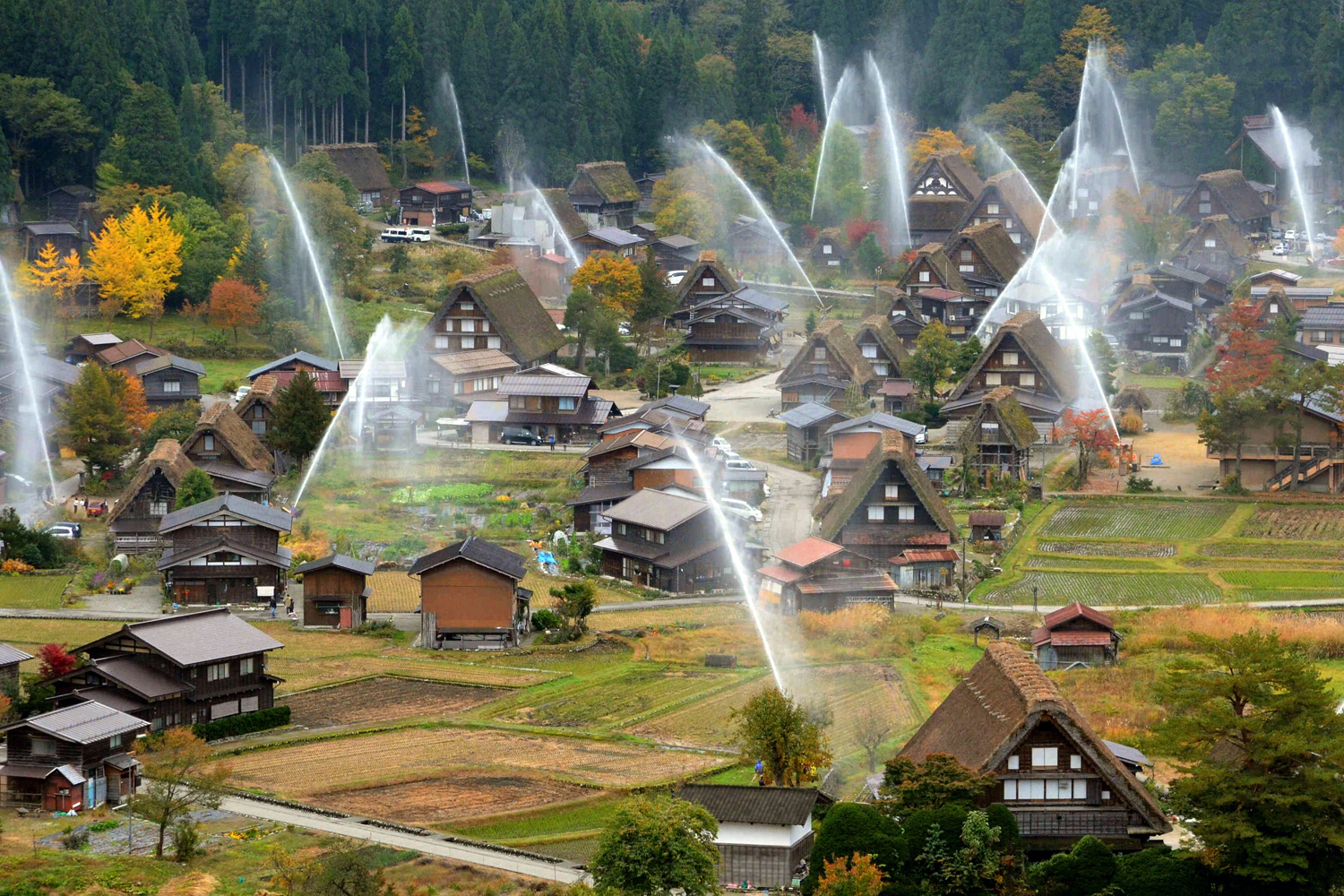 Image: Nov. 4, 2012. Water is discharged at the Shirakawa-go World Heritage in Shirakawa, Gifu, Japan. This annual drill is held to prevent fire.