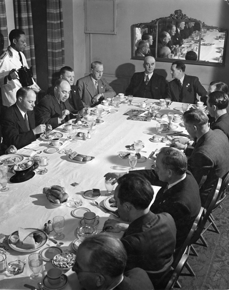 President of the CIO (Congress of Industrial Organizations) Phil Murray -- at head of table, left, above -- with other labor leaders, Ohio, 1944.