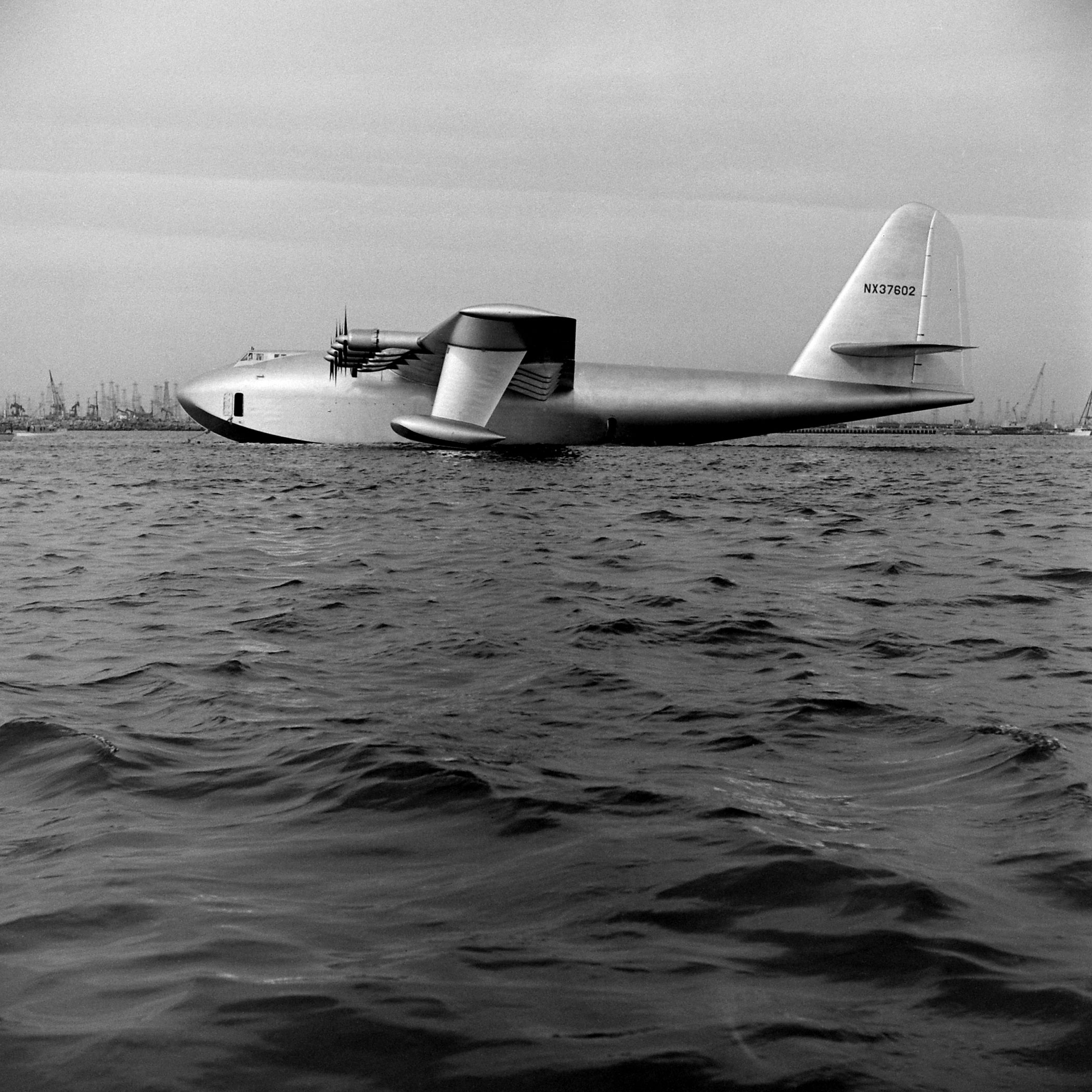 Howard Hughes' H-4 Hercules troop transport plane, the "Spruce Goose," Long Beach Harbor, Calif., November 1947.