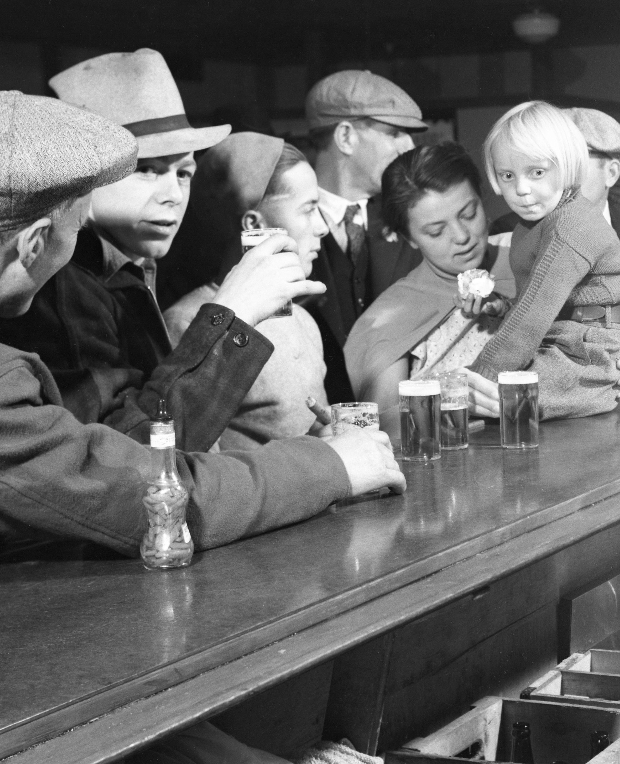 Drinking at the bar Finis, Montana, 1936.
