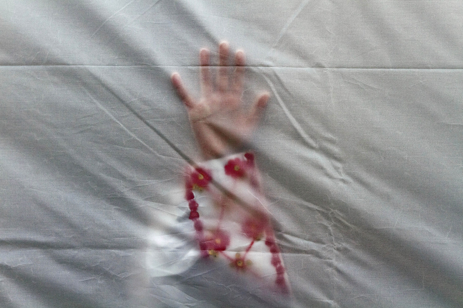 Image: Oct. 27, 2012. A child leans against a tent wall while putting on a costume in Bucharest, Romania during celebrations of the Eid al-Adha organized by the Turkish community.