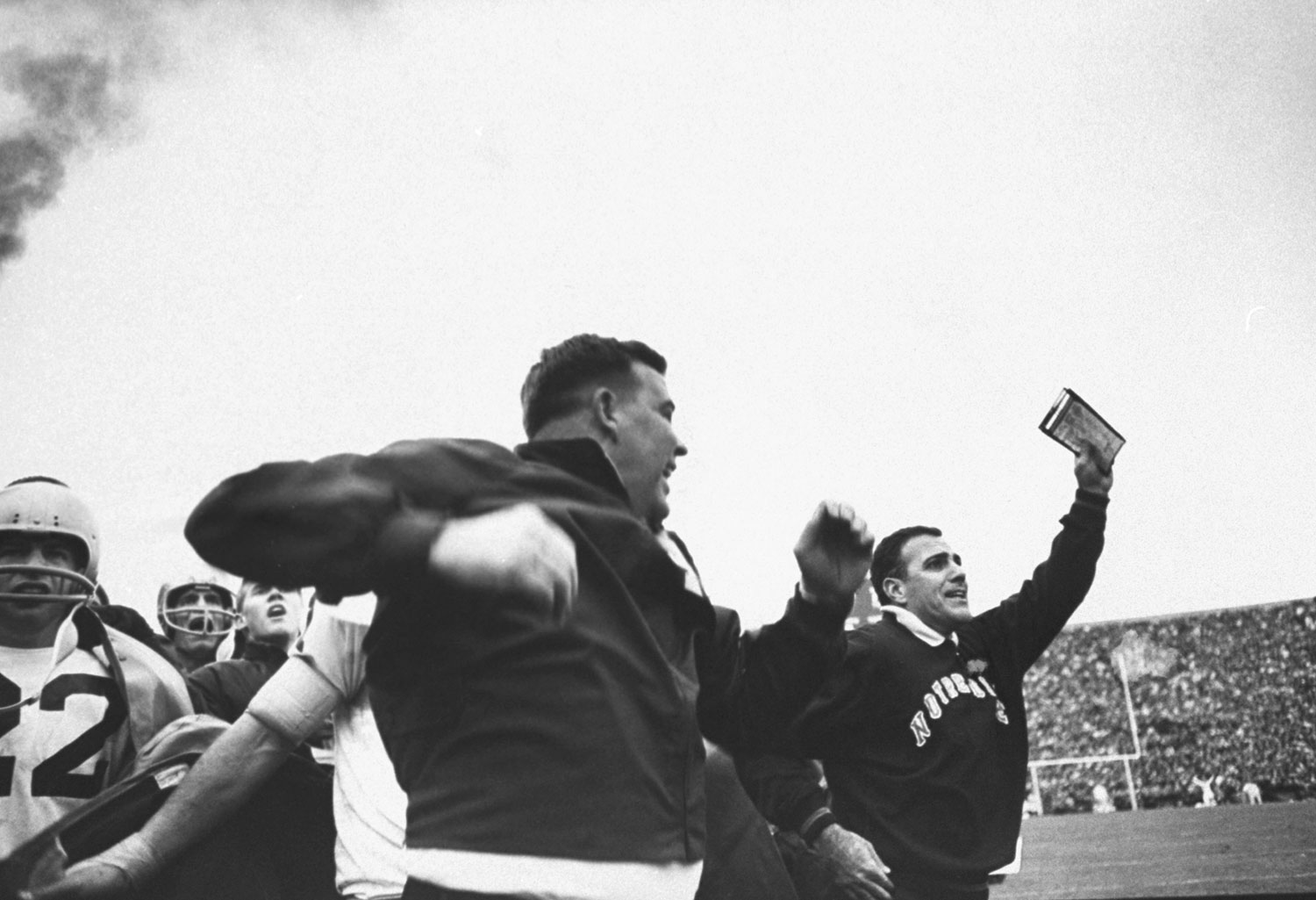 Scene on the Notre Dame sideline, Nov. 19, 1966, before a fourth-quarter field goal attempt against Michigan State. At right, Fighting Irish coach Ara Parseghian.