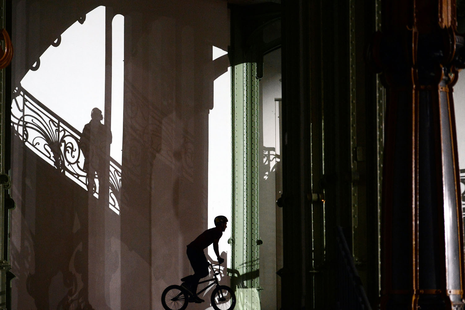 Image: Nov. 2, 2012. A rider concentrates prior to competing in the "Red Bull Skylines," an international BMX competition at the Grand Palais in Paris.