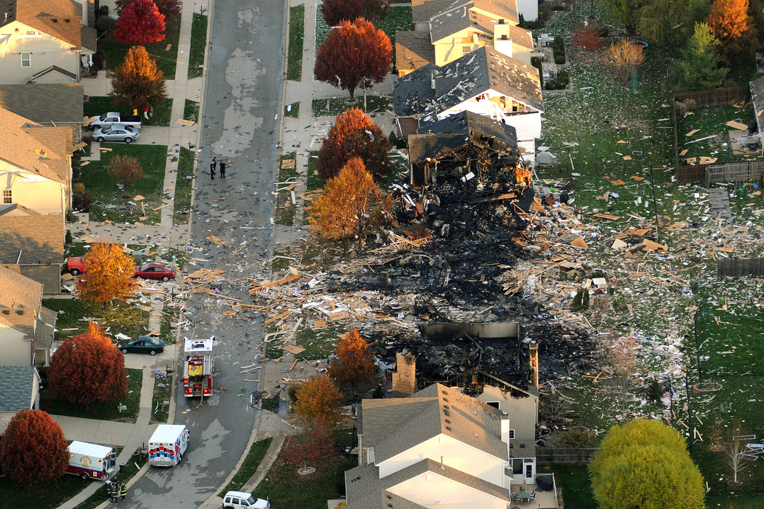 Image: Nov. 11, 2012. Two homes were leveled and numerous neighboring homes were damaged by a massive explosion that sparked a huge fire and killed two people in Indianapolis.