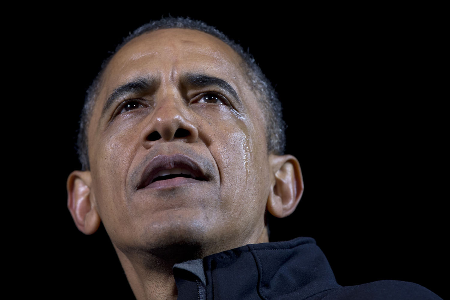 Image: Nov. 5, 2012. President Obama speaks, as a tear streams down his face, at his final campaign stop on the evening before the 2012 presidential election in Des Moines.