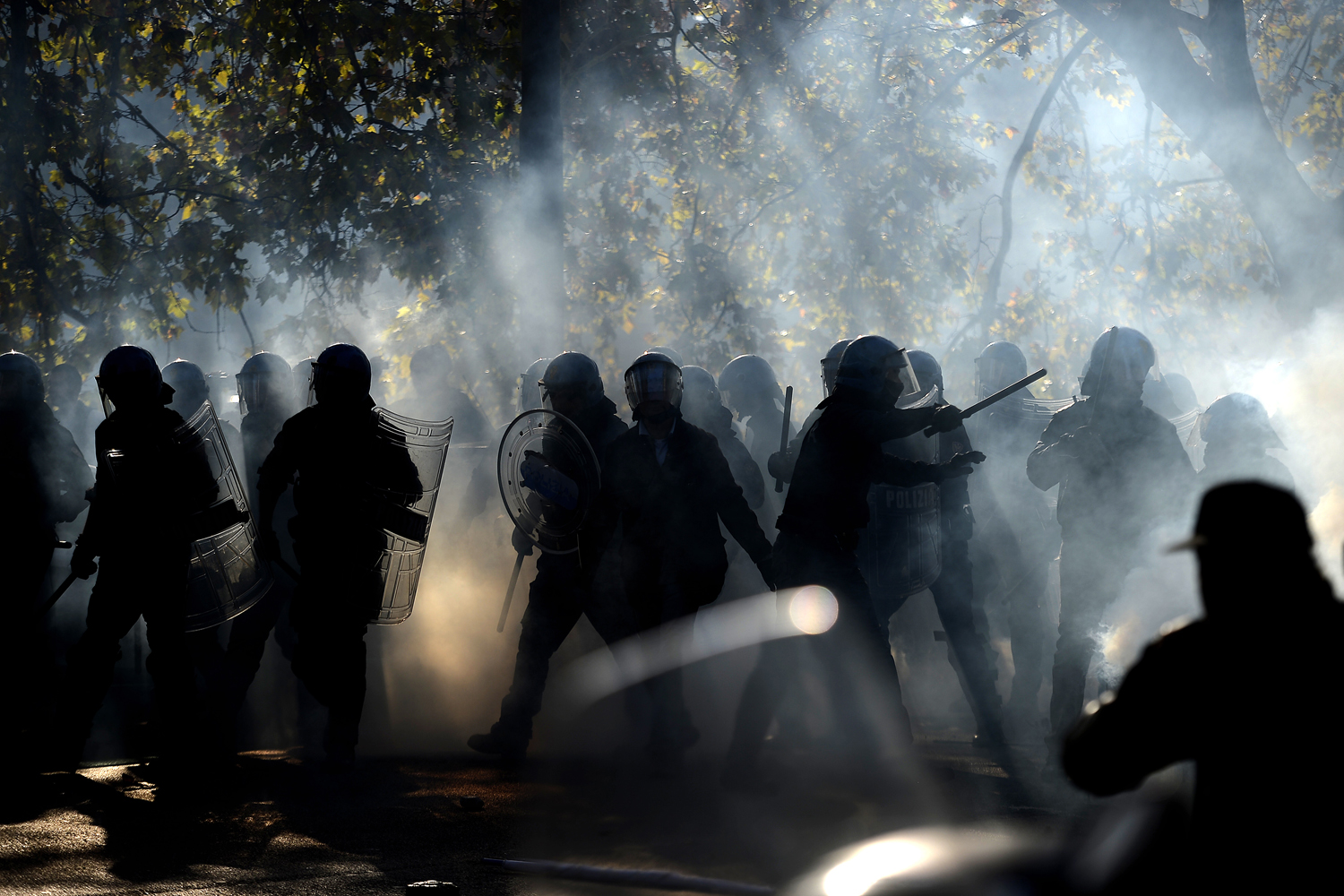 Image: Nov. 14, 2012. Demonstrators fights with riot policemen during a protest on a day of mobilization against austerity measures by workers in Rome.