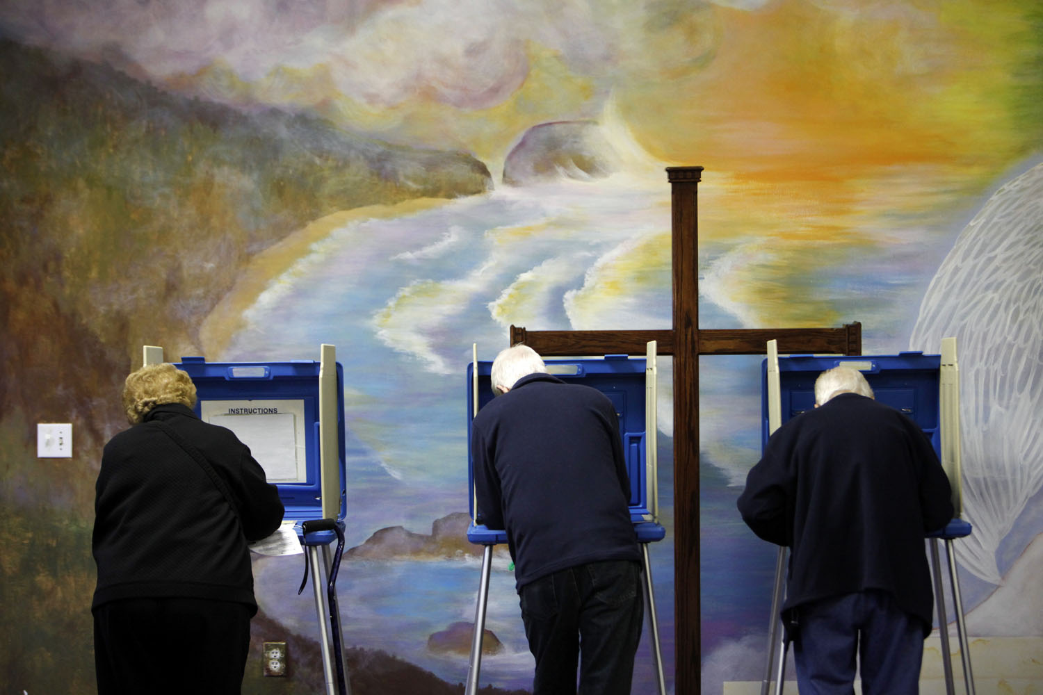 Image: Nov. 6, 2012. Voters cast ballots at the Fellowship of Christ church in Cary, N.C. on Election Day.