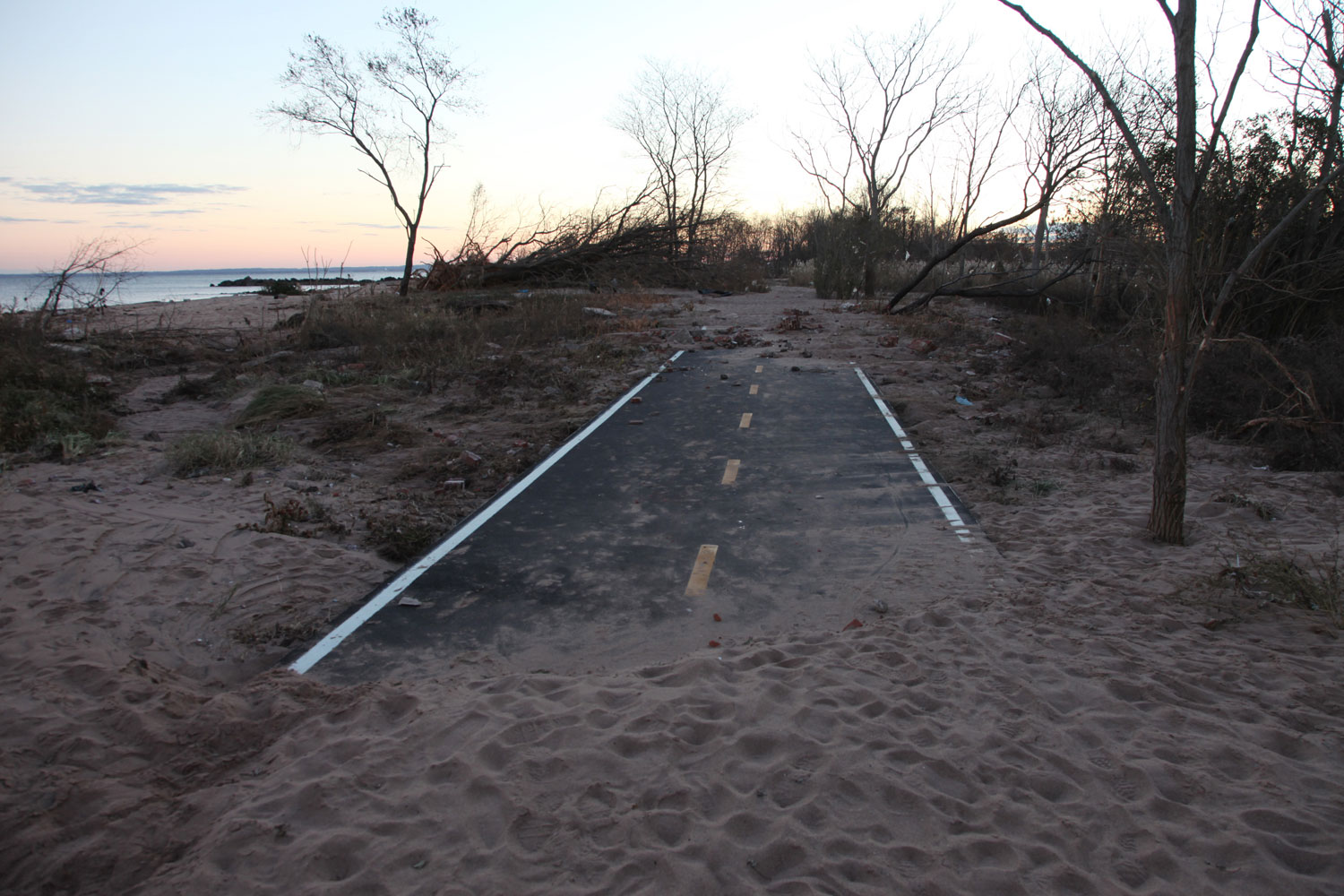 A small road along Cedar Grove Beach in New Dorp was covered by sand.