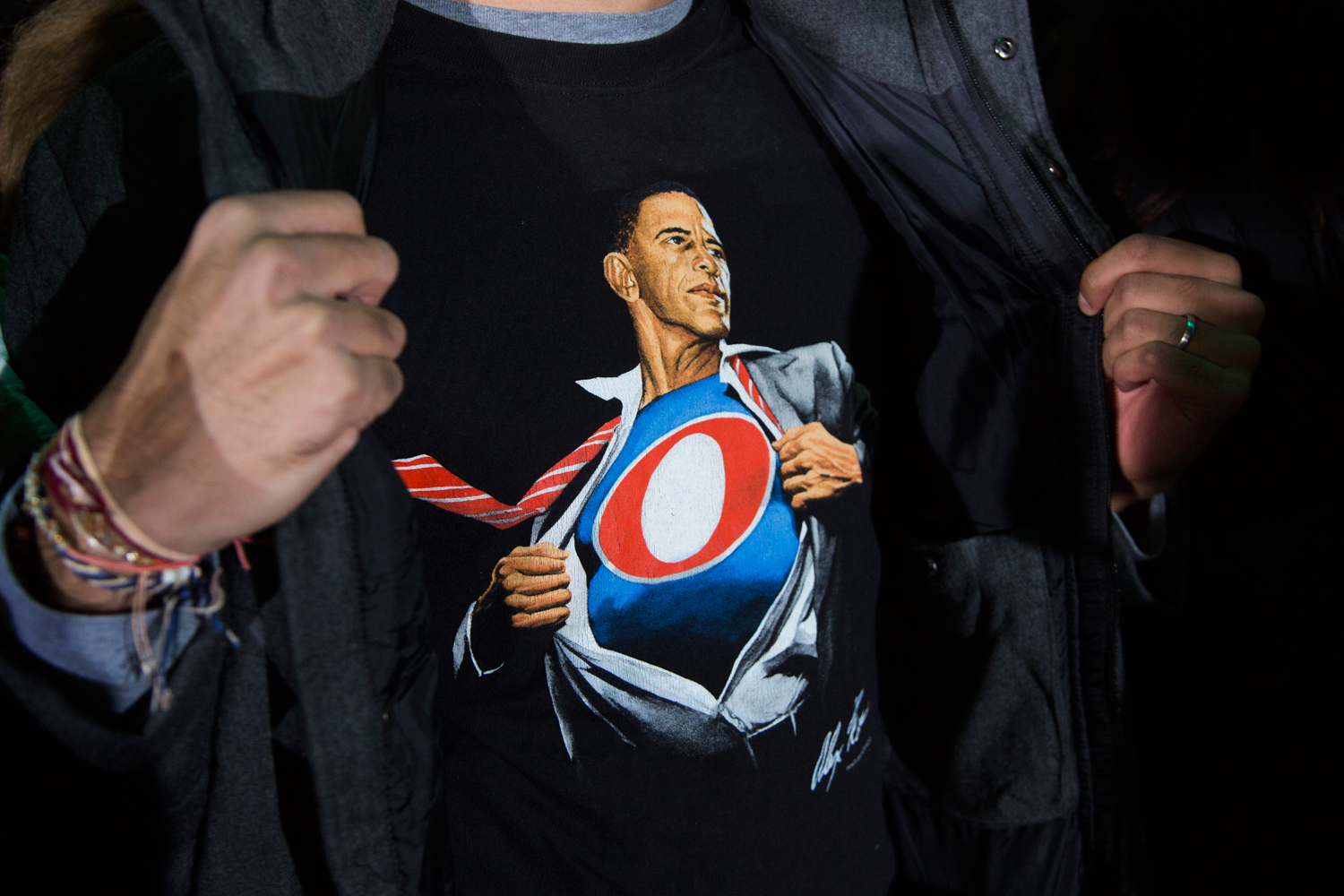 Image: A supporter shows off his tee-shirt at a campaign event with President Obama in Hilliard, Ohio. Nov. 2, 2012.