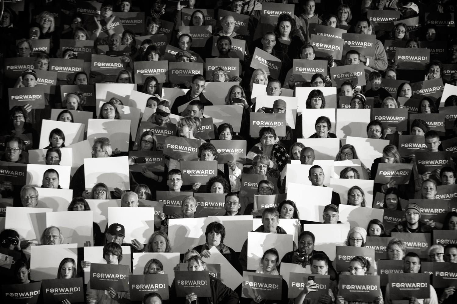 Image: Nov. 3, 2012. Members of the audience make an "O" during a campaign rally with President Obama in Mentor, Ohio. Nov. 3, 2012.