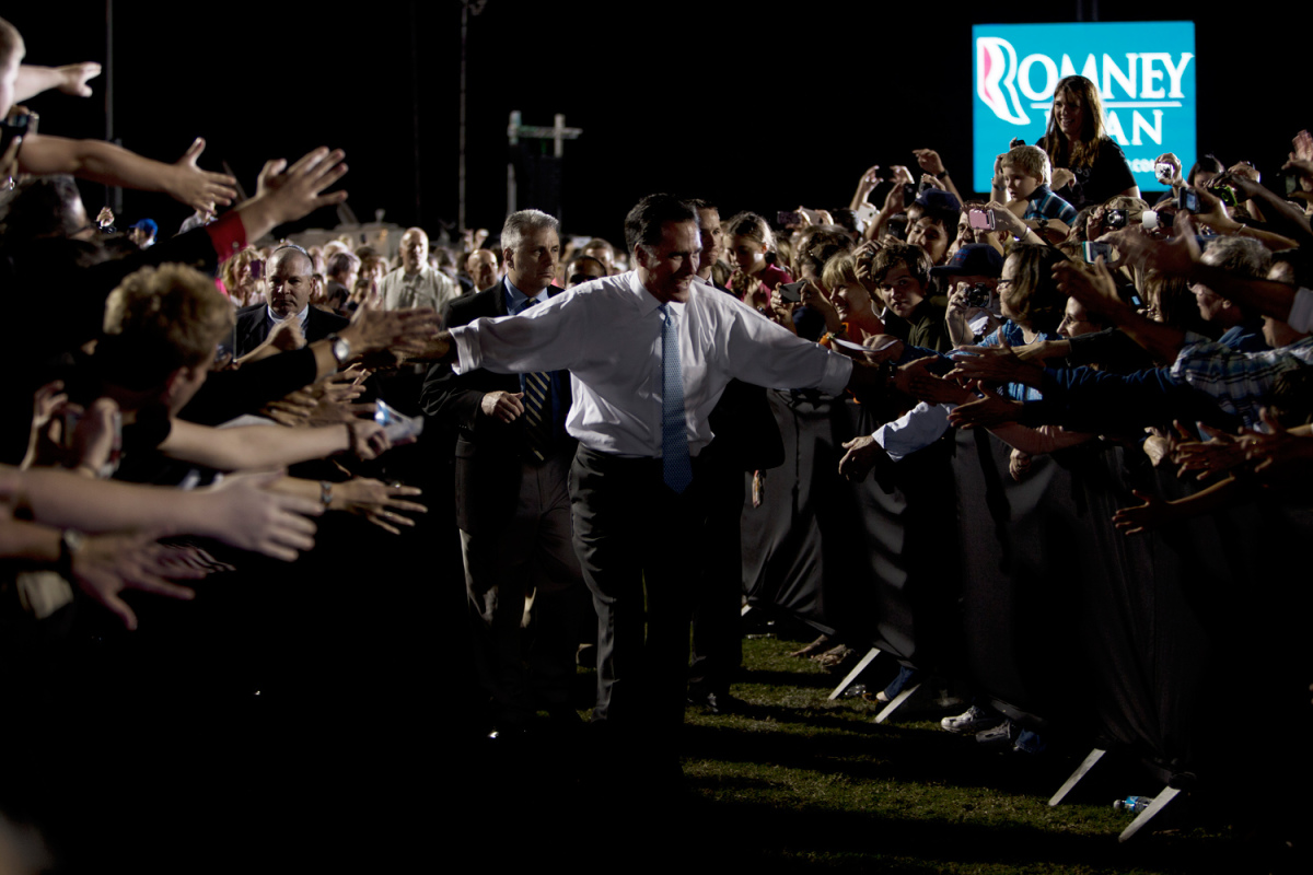 Oct. 27, 2012. Romney supporters in Land O' Lakes, Fla. stretched to high-five Romney as he left the rally.