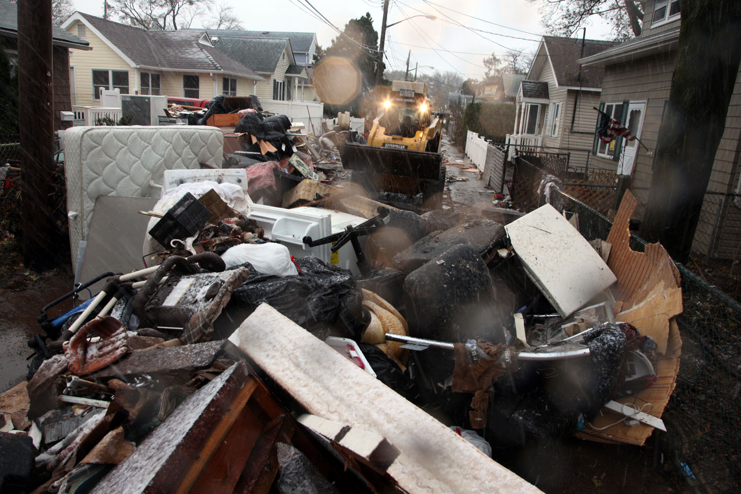 Image: Removal of debris on Wavecrest Street, close to Cedar Grove BeachÑan area hit hard by the storm.