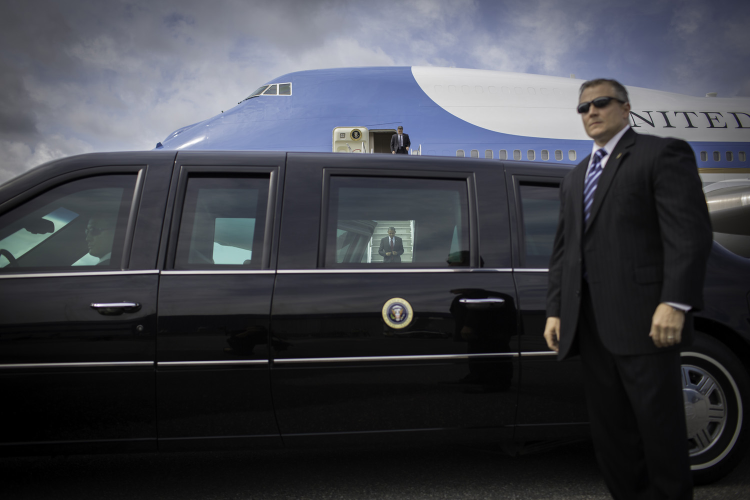 Image: President Obama exits Air Force One upon arriving at the airport in Manchester, N.H. Aug. 18, 2012.