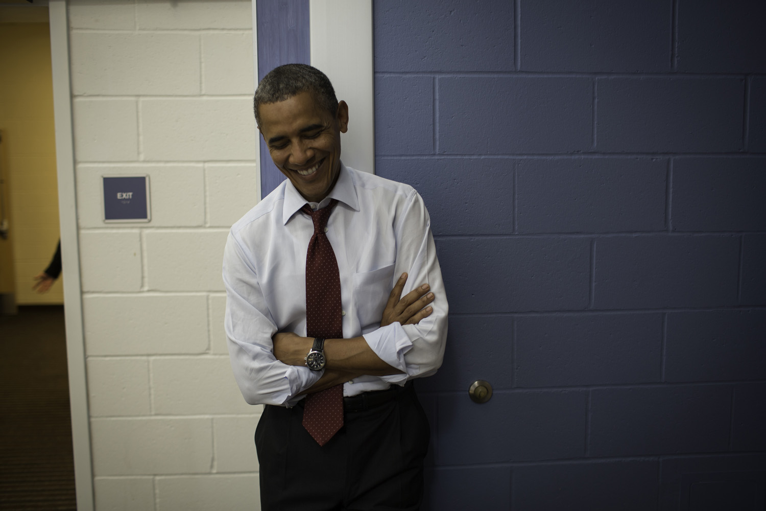 Image: President Obama waits in the hallway while being introduced at a rally at Windham High School in Windham, N.H. Aug. 18, 2012.