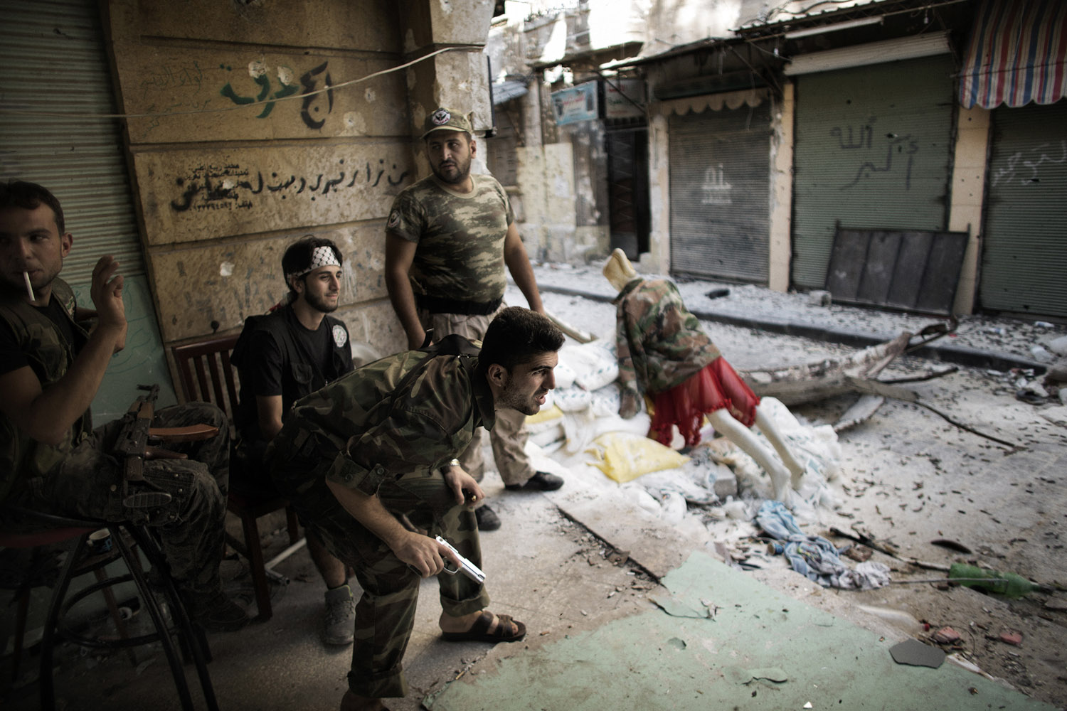 Sept. 16, 2012. Free Syria Army fighters man a position in the Old City of Aleppo, Syria.