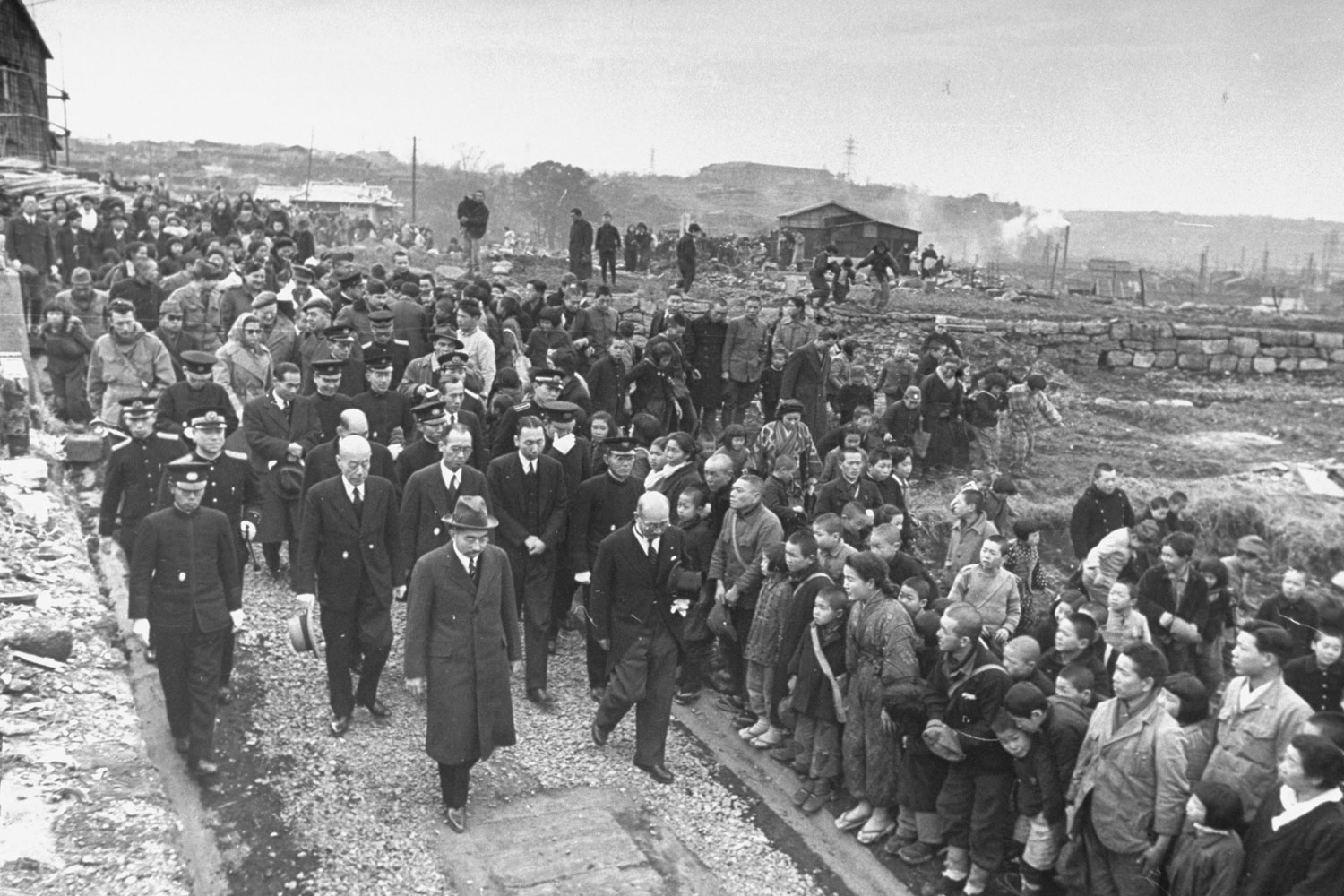 Japan's Emperor Hirohito in Yokohama during his first visit to see living conditions in the country since the end of the war, February 1946.