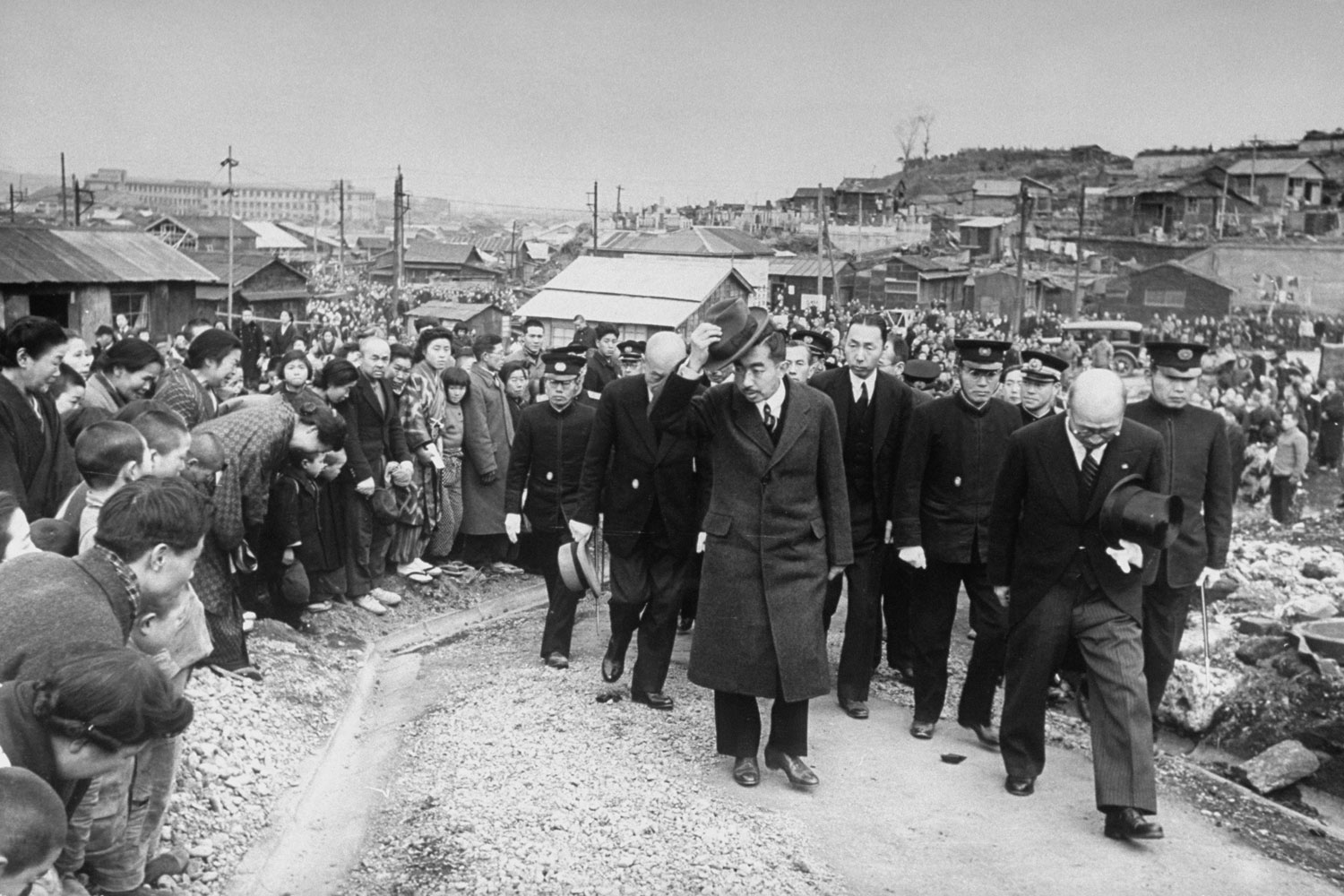 Japan's Emperor Hirohito in Yokohama during his first visit to see living conditions in the country since the end of the war, February 1946.