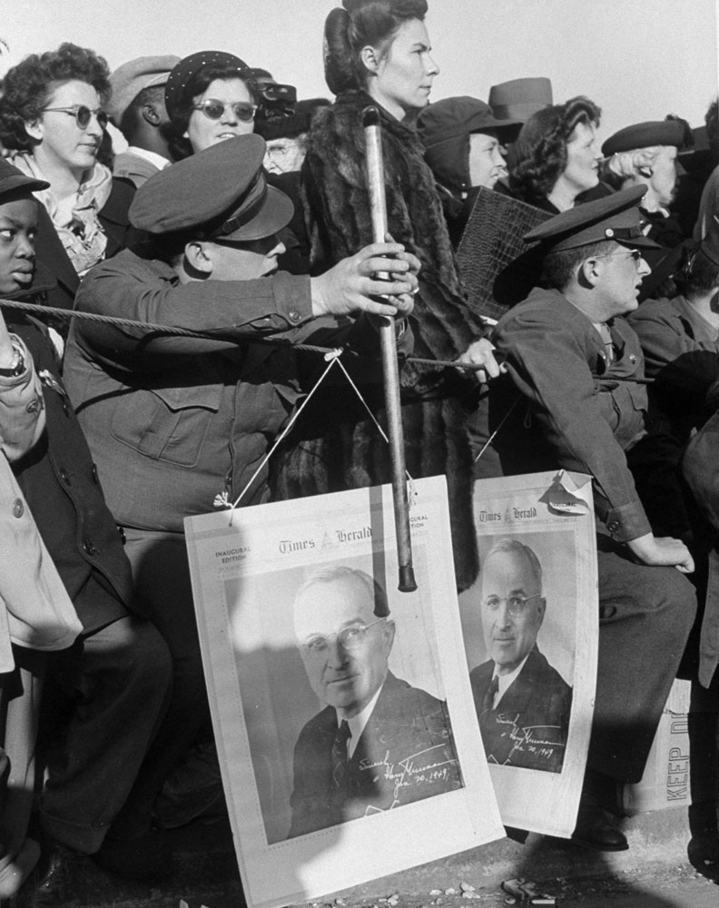 Spectators enjoy the celebrations during the 1949 inauguration parade.