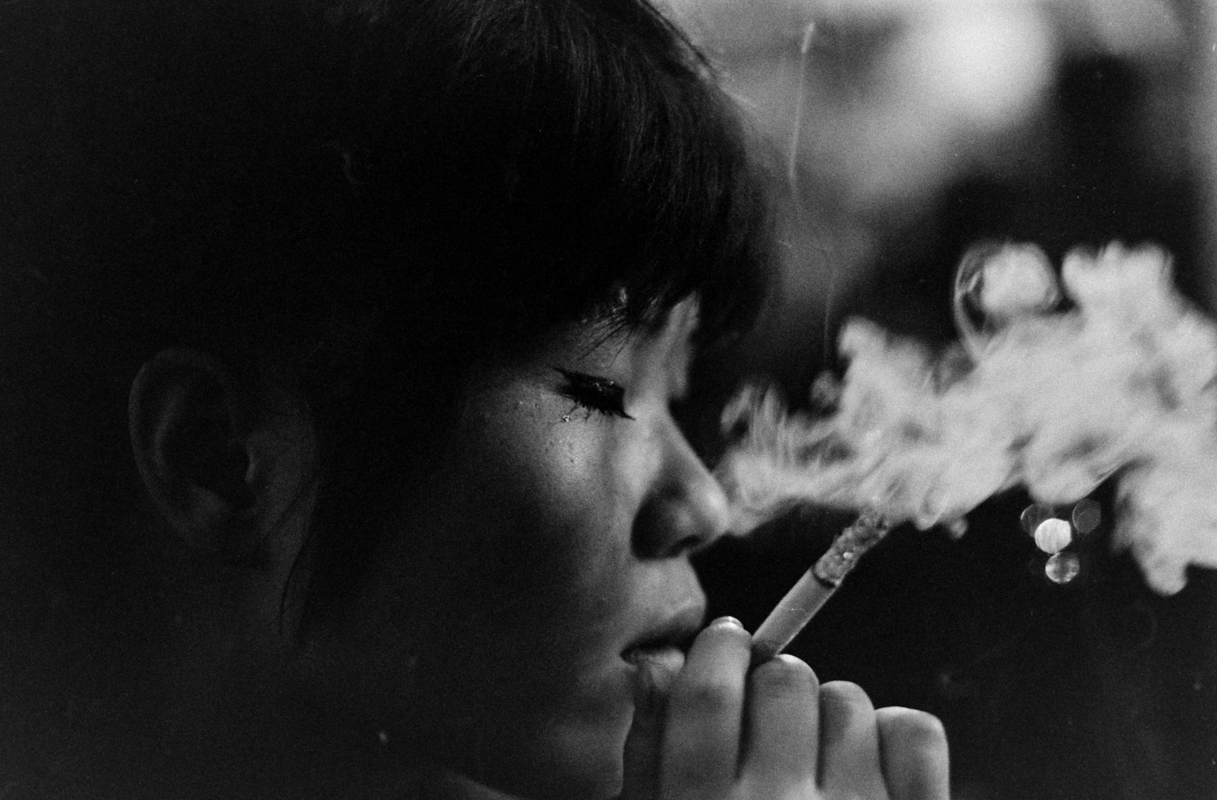 Kako, languid from sleeping pills, is lost in a world of her own in a jazz club in Tokyo, 1964.