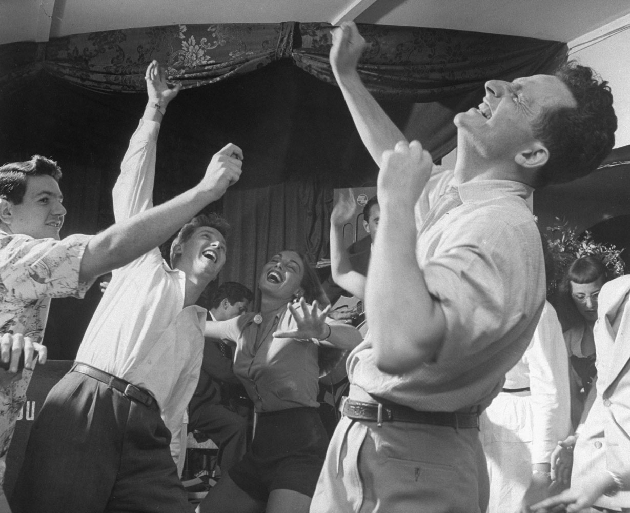 Milton Hood Ward (right) leads his "Activationist" followers on the dance floor, Cape Cod, 1948.