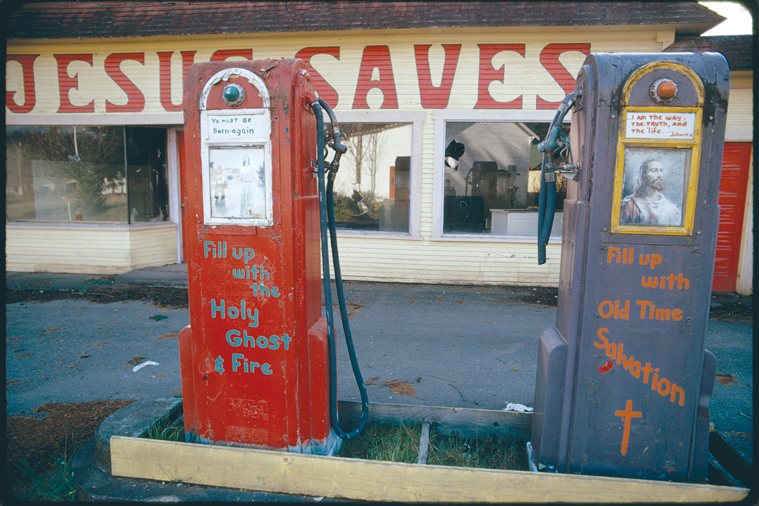 Gasoline stations abandoned during the fuel crisis in winter of 1973-74 were sometimes used for other purposes. Potlatch, Washington, 1974.