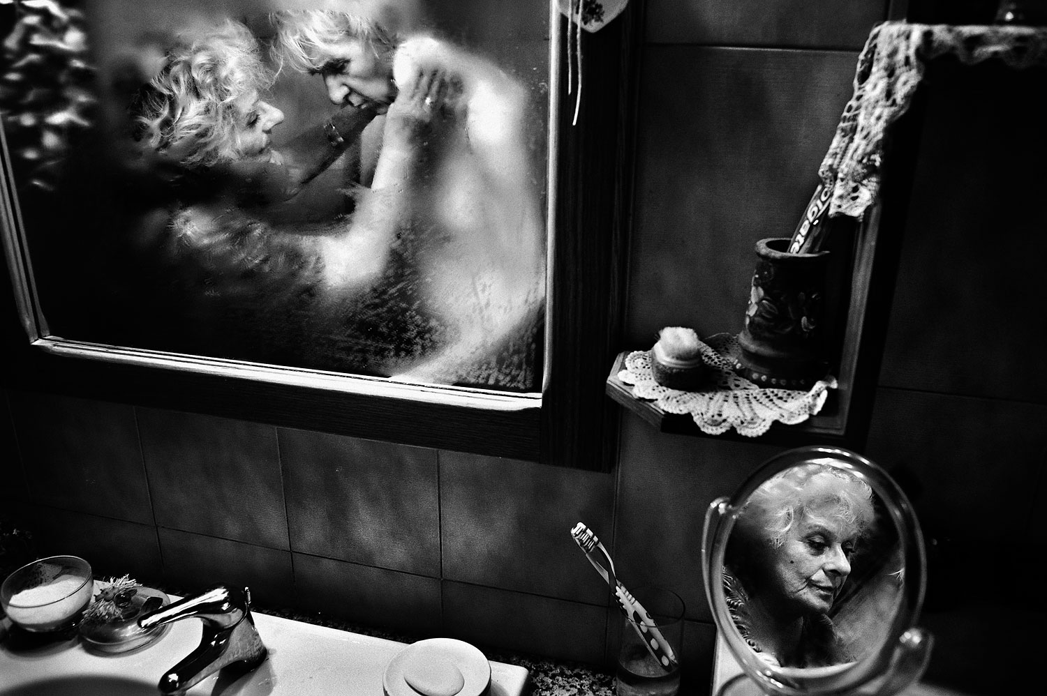 1st Prize Daily Life Stories. Fausto Podavini, Italy. 1 June 2010, Rome, Italy. Despite her husband's life-threatening disease, Mirella devoted her life to assisting Luigi, trying to be positive and reassuring, looking after him with intense love and respect. Everyday care, usually done in a few minutes, takes hours when it concerns someone with dementia. Mirella, 71, spent 43 years of her life with the only person she loved, with all of life's difficulties, laughter, and beautiful moments. But over the last six years things changed: Mirella lived with her husband Luigi’s illness, Alzheimer’s, and devoted her life to him as his caregiver.