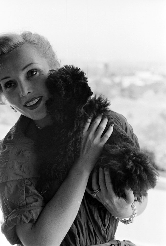 Zsa Zsa Gabor with her dog, Farouk, California, 1951.