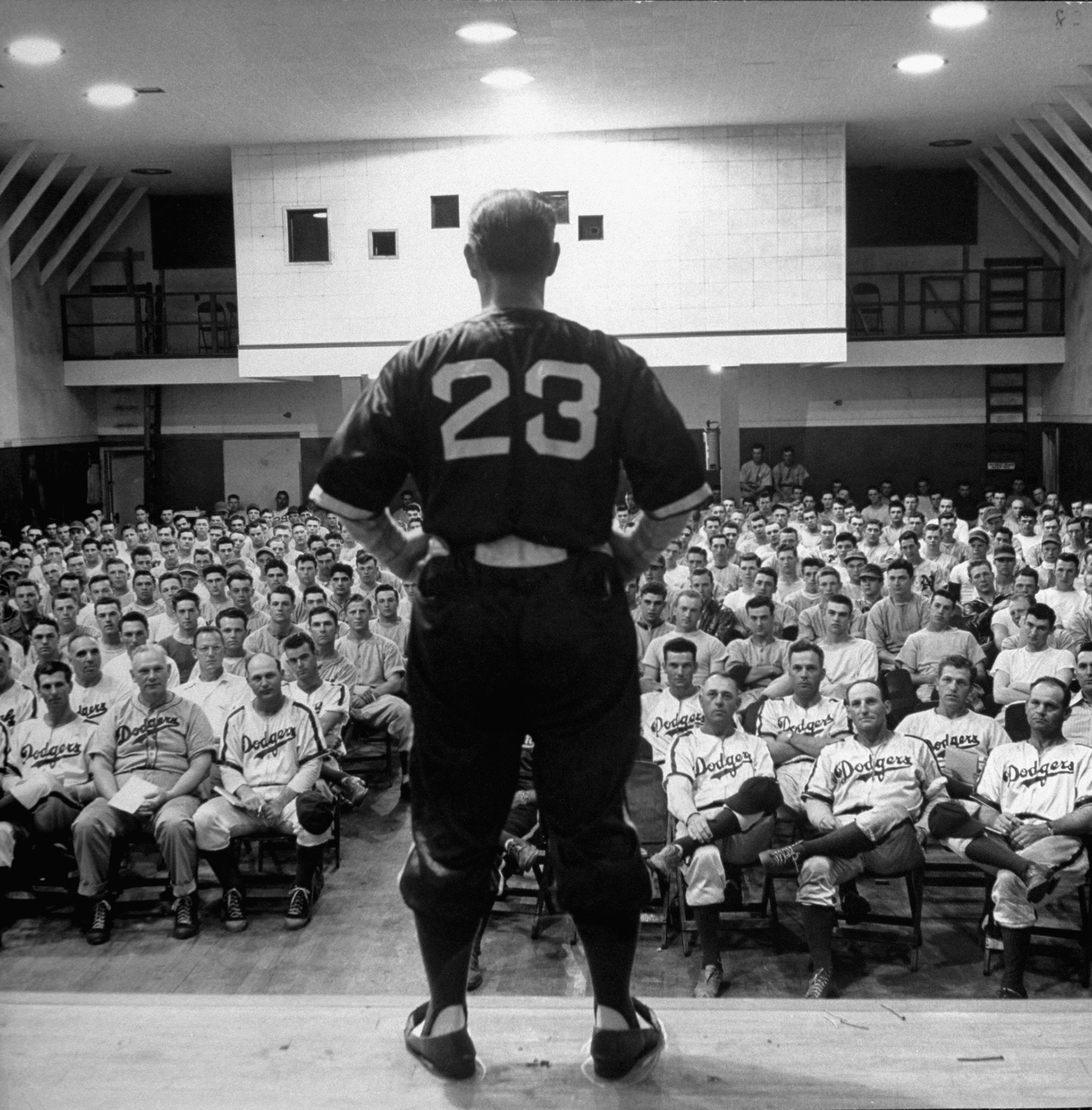 Fresco Thompson, a former National League infielder, talks to Dodger coaches and prospects, Dodgertown, Fla., 1948.