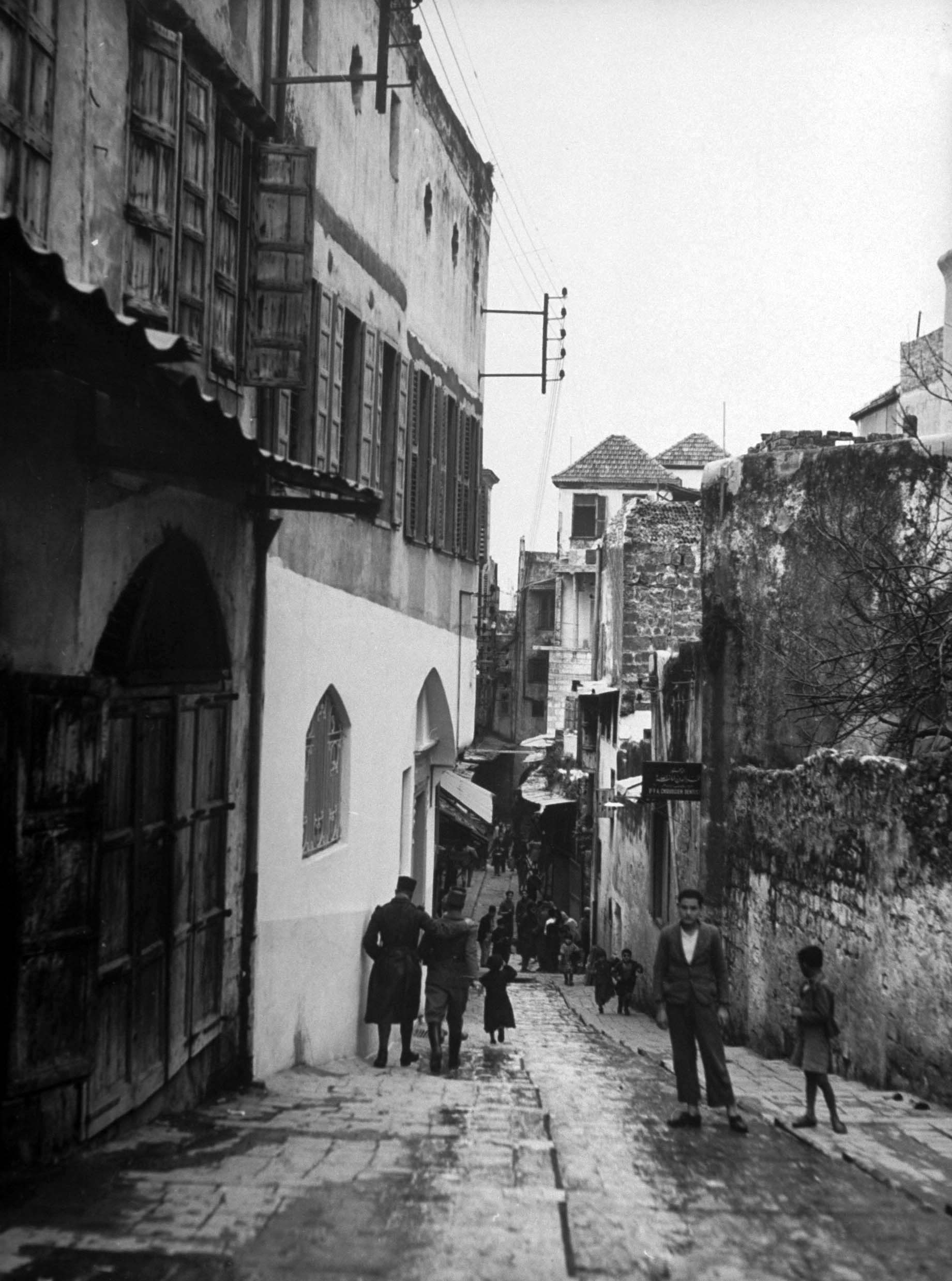 A narrow street in downtown Aleppo, Syria, 1940.