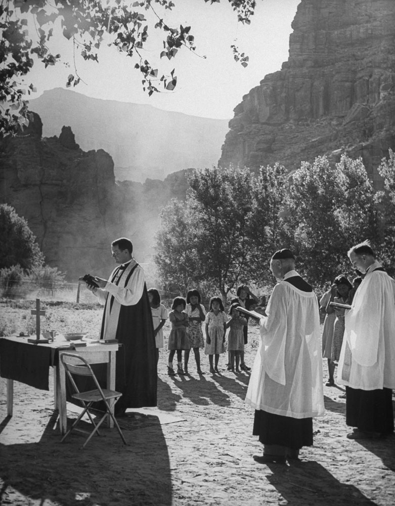 Bishop Arthur B. Kinsolving conducts an open air baptism in the Grand Canyon, 1946.