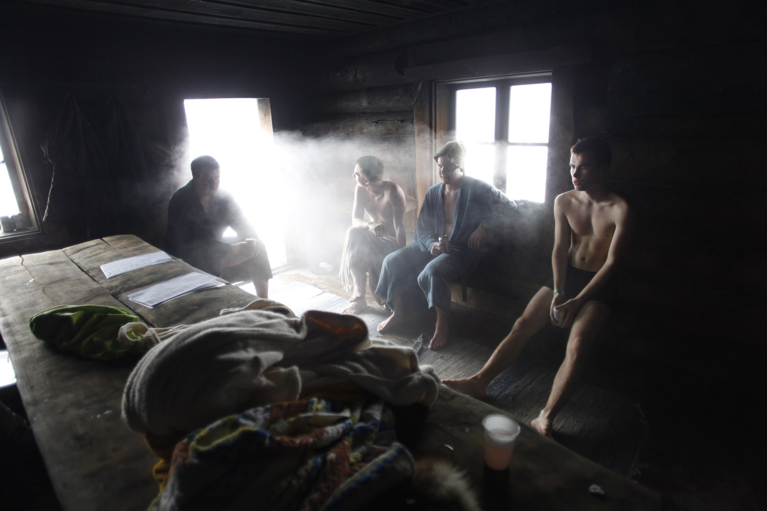 Participants relax after a sauna bath during the European Sauna Marathon in Otepaa