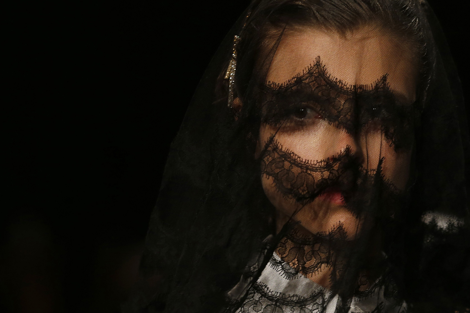 A model presents a creation from the Meadham Kirchhoff Autumn/Winter 2013 collection during London Fashion Week