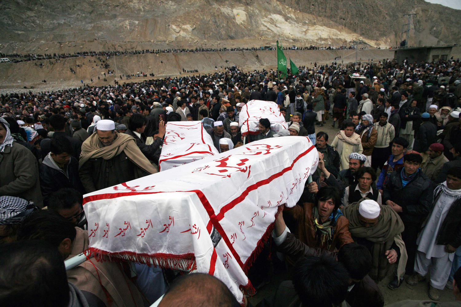 Shi'ite Muslims carry coffins of victims killed in Saturday's bomb attack, during a funeral in Quetta
