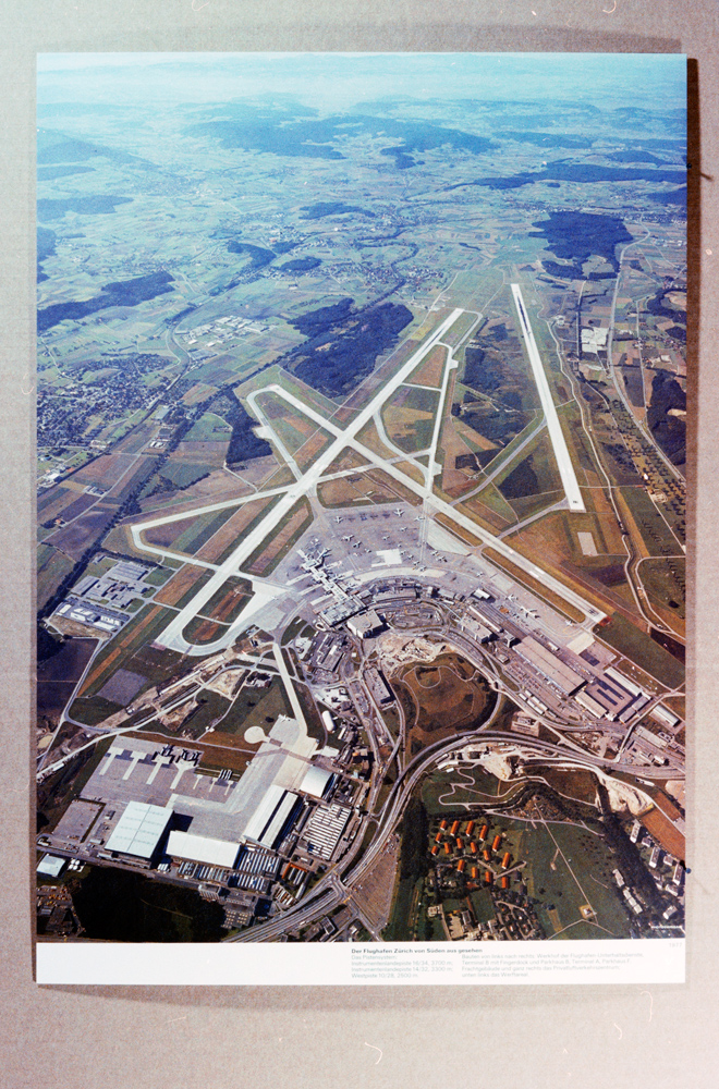 Reproduction of a poster from Zurich-Kloten Airport, 1982.